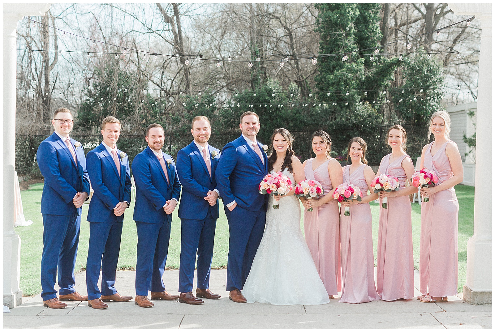 Soft Pink Navy Blue Color Theme Bridesmaid Bride Tribe and Groomsmen Group Photo from Light and Airy Outdoor Wedding at Separk Mansion in Gastonia, NC | Kevyn Dixon Photography