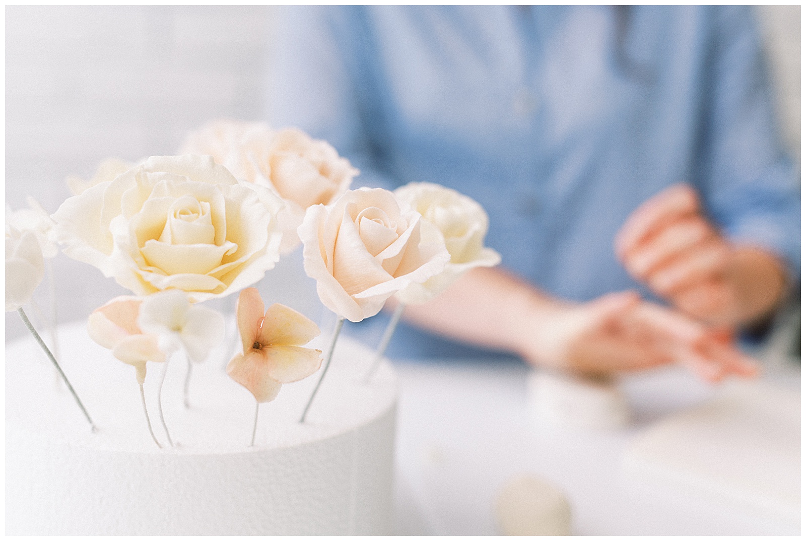 Charlotte NC Wedding Cake Designer Aryn Keogh at Delish Cakery Making Sugar Flowers