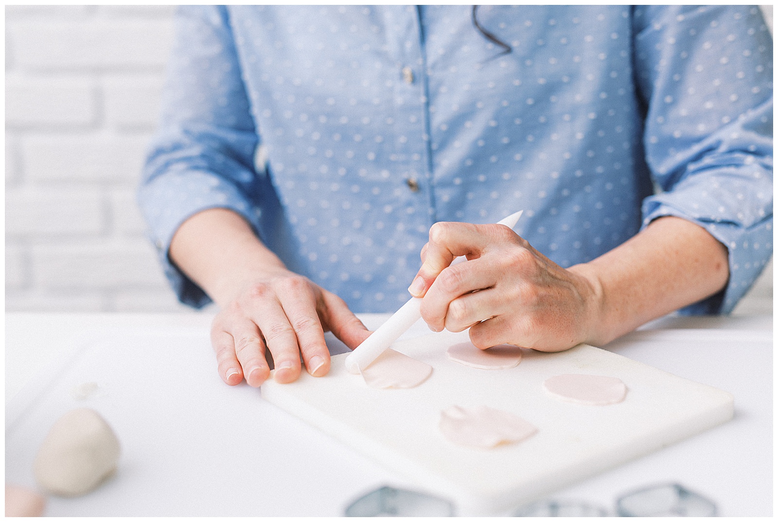 Charlotte NC Wedding Cake Designer Aryn Keogh at Delish Cakery Making Sugar Flowers