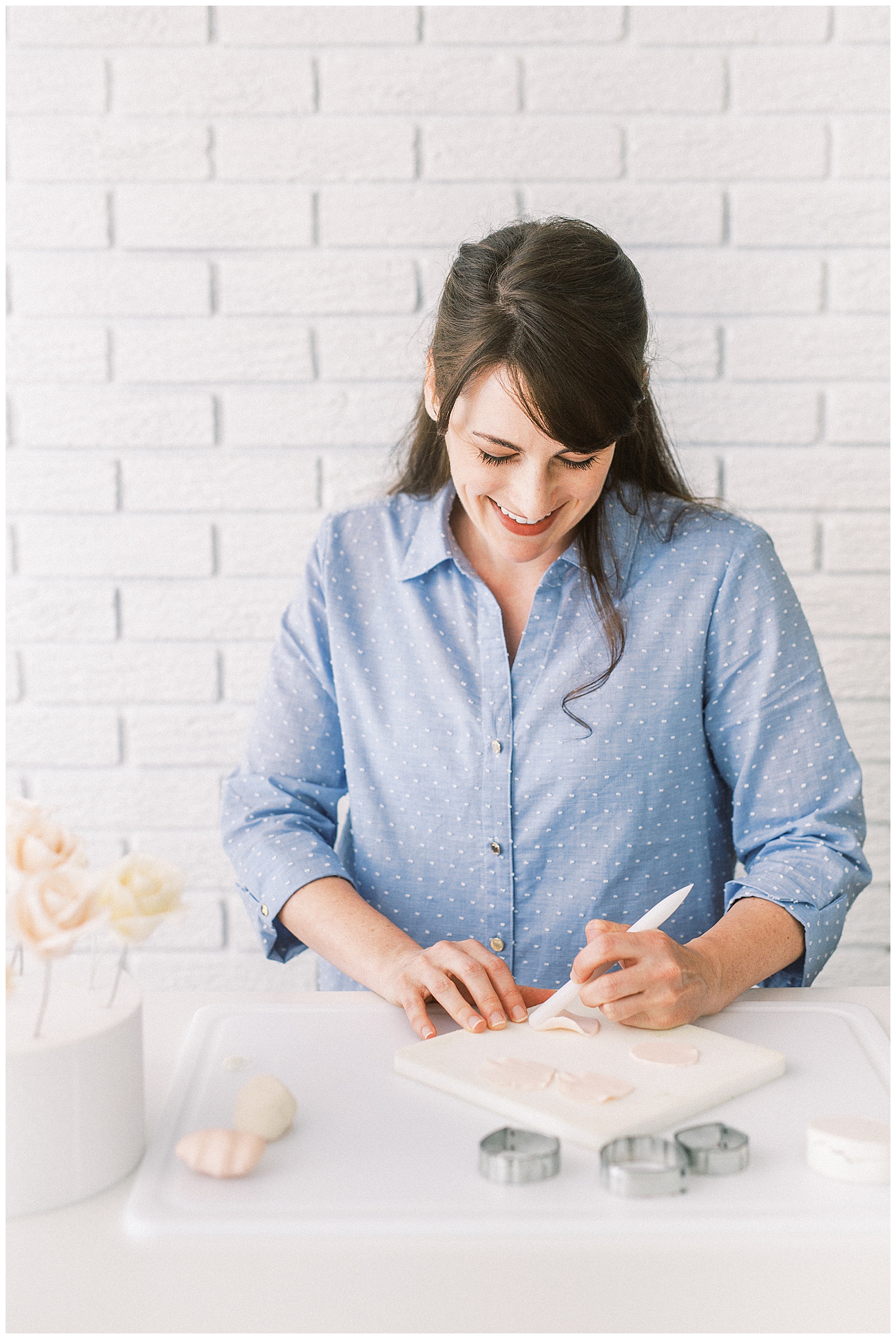 Charlotte NC Wedding Cake Designer Aryn Keogh at Delish Cakery Making Sugar Flowers