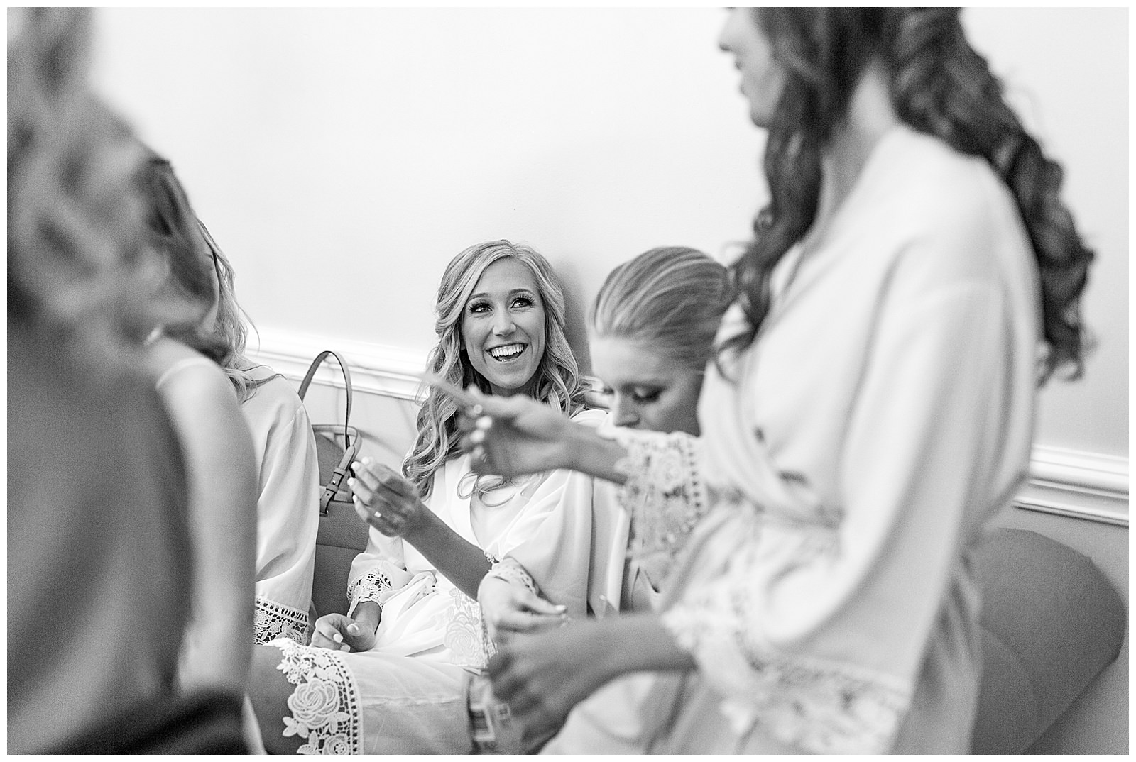 bride getting ready black and white photo