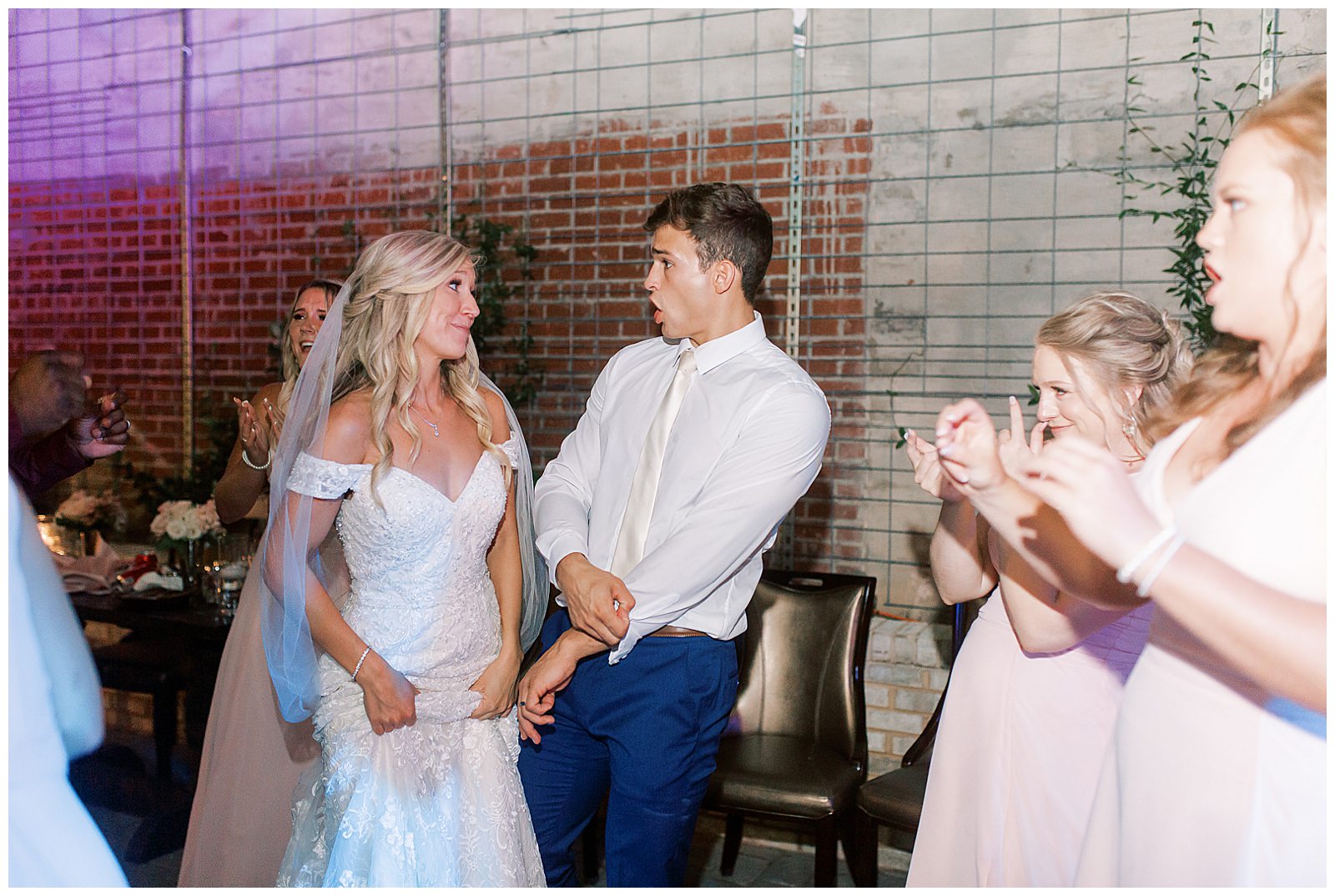 bride and groom dance party at esquire hotel outdoor patio wedding reception