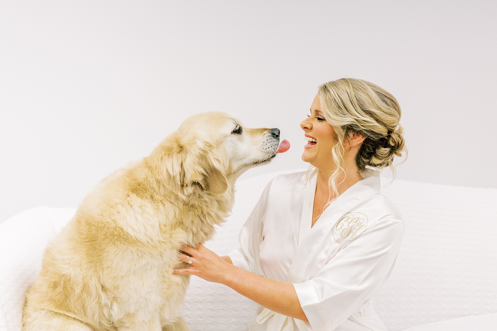 bride poses with dog before SC wedding day