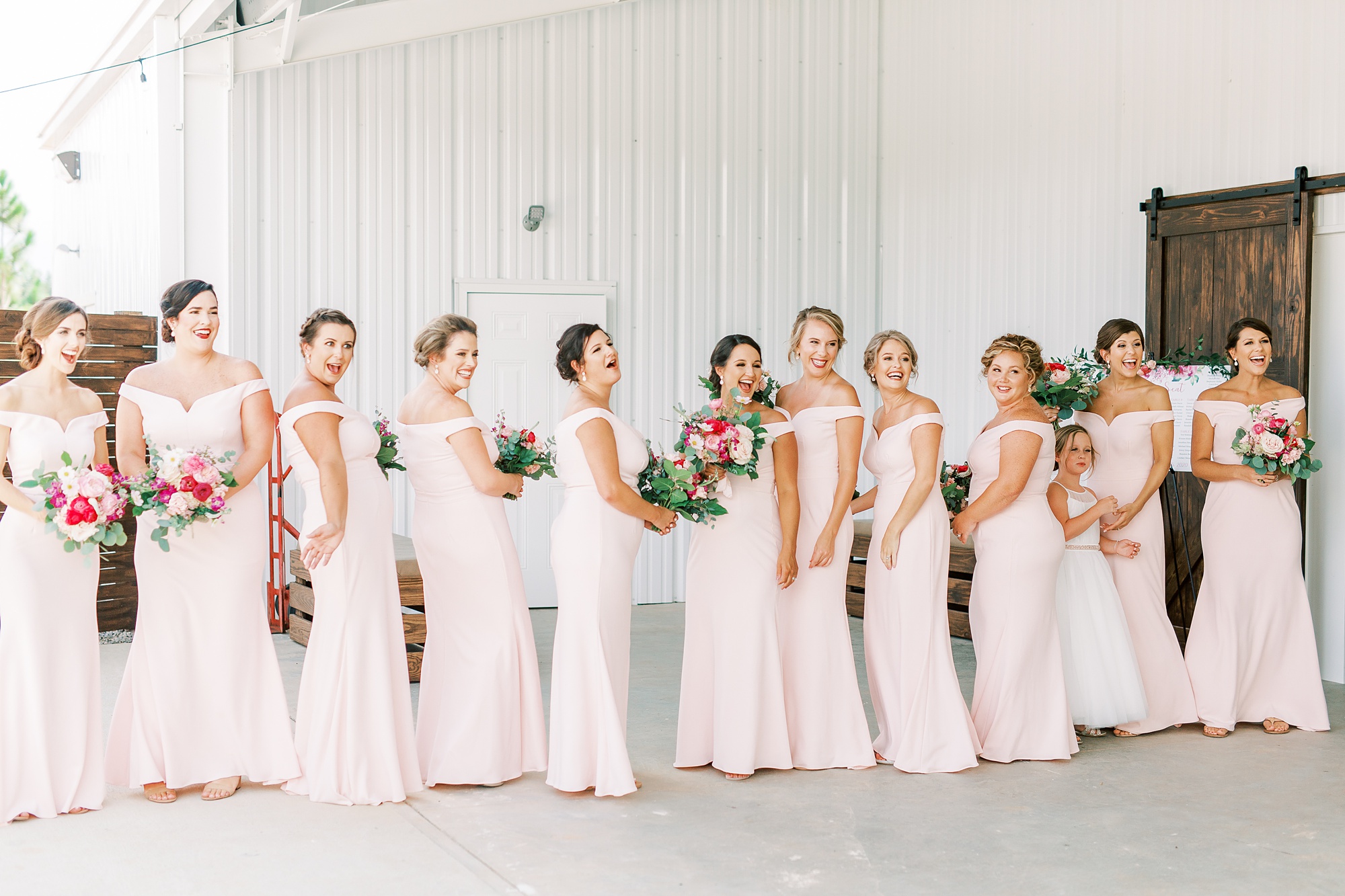 bridesmaids first look for bride in gown