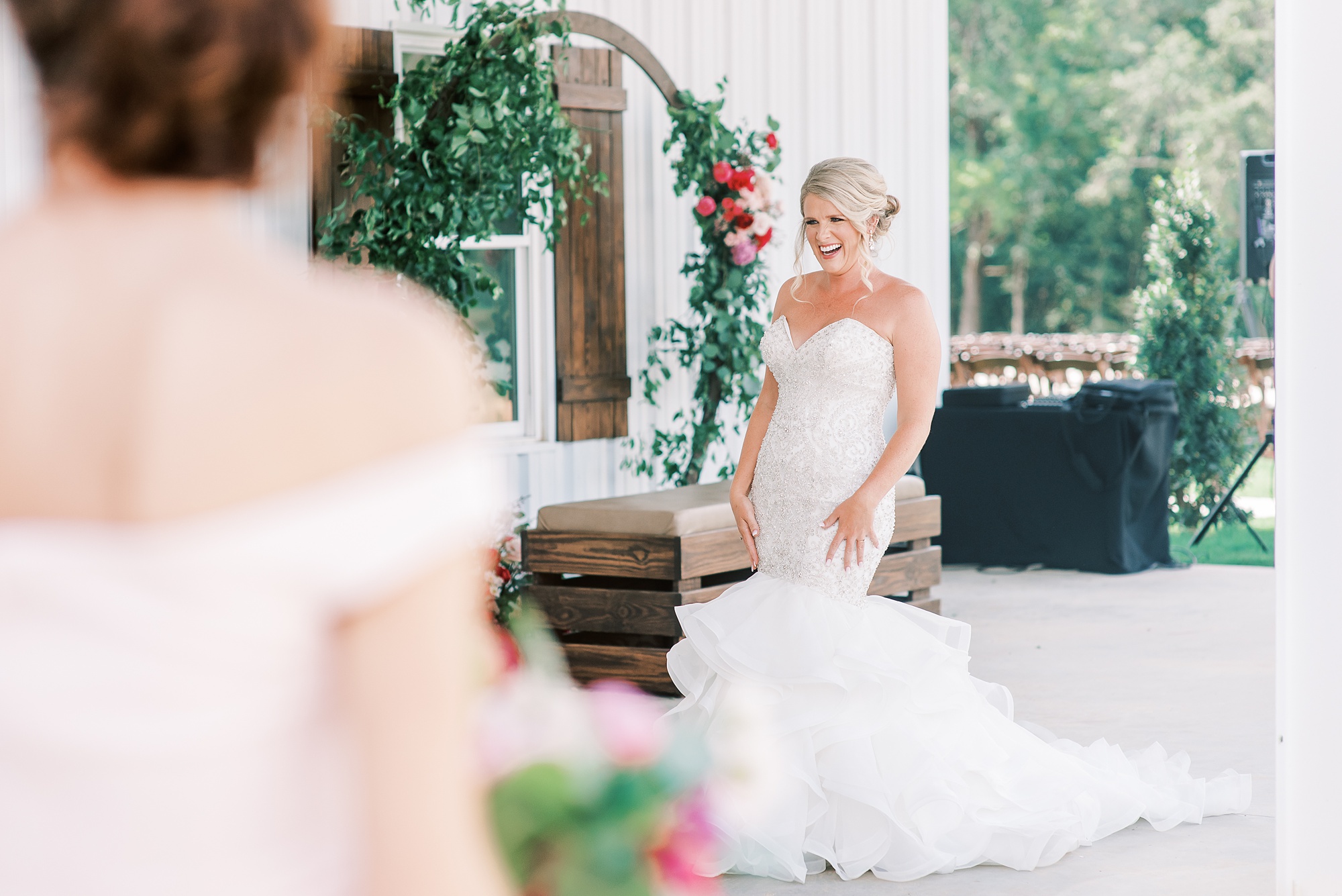 bride and bridesmaids have dress reveal