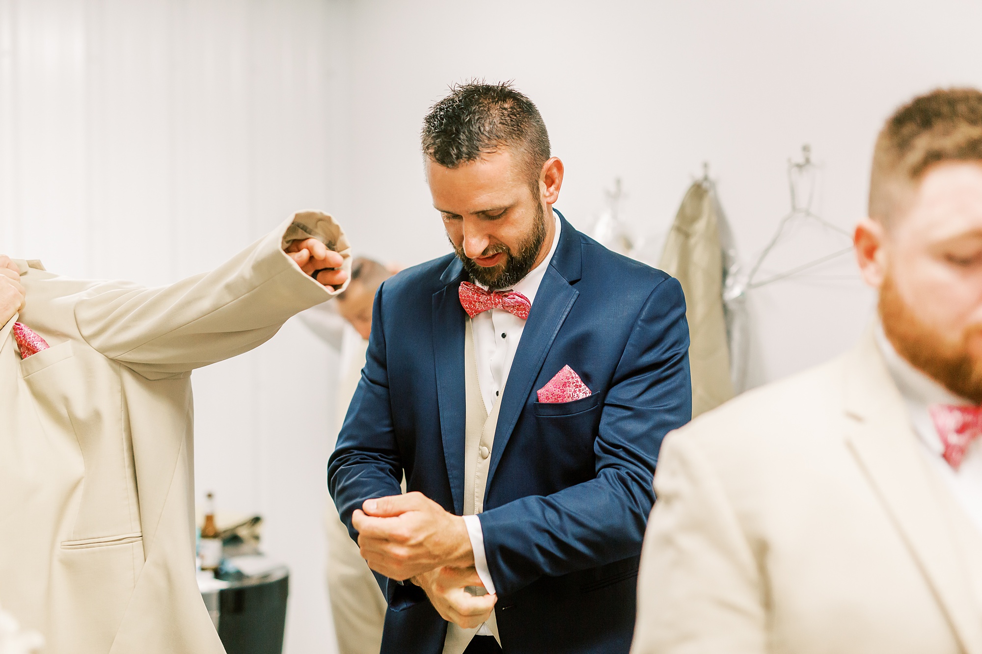 groom prepares for Belle's Venue wedding