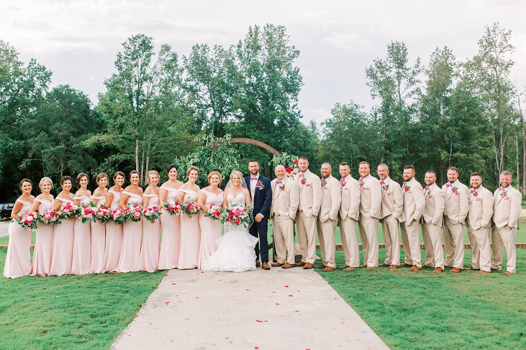 bride and groom pose with big bridal party in Jefferson SC
