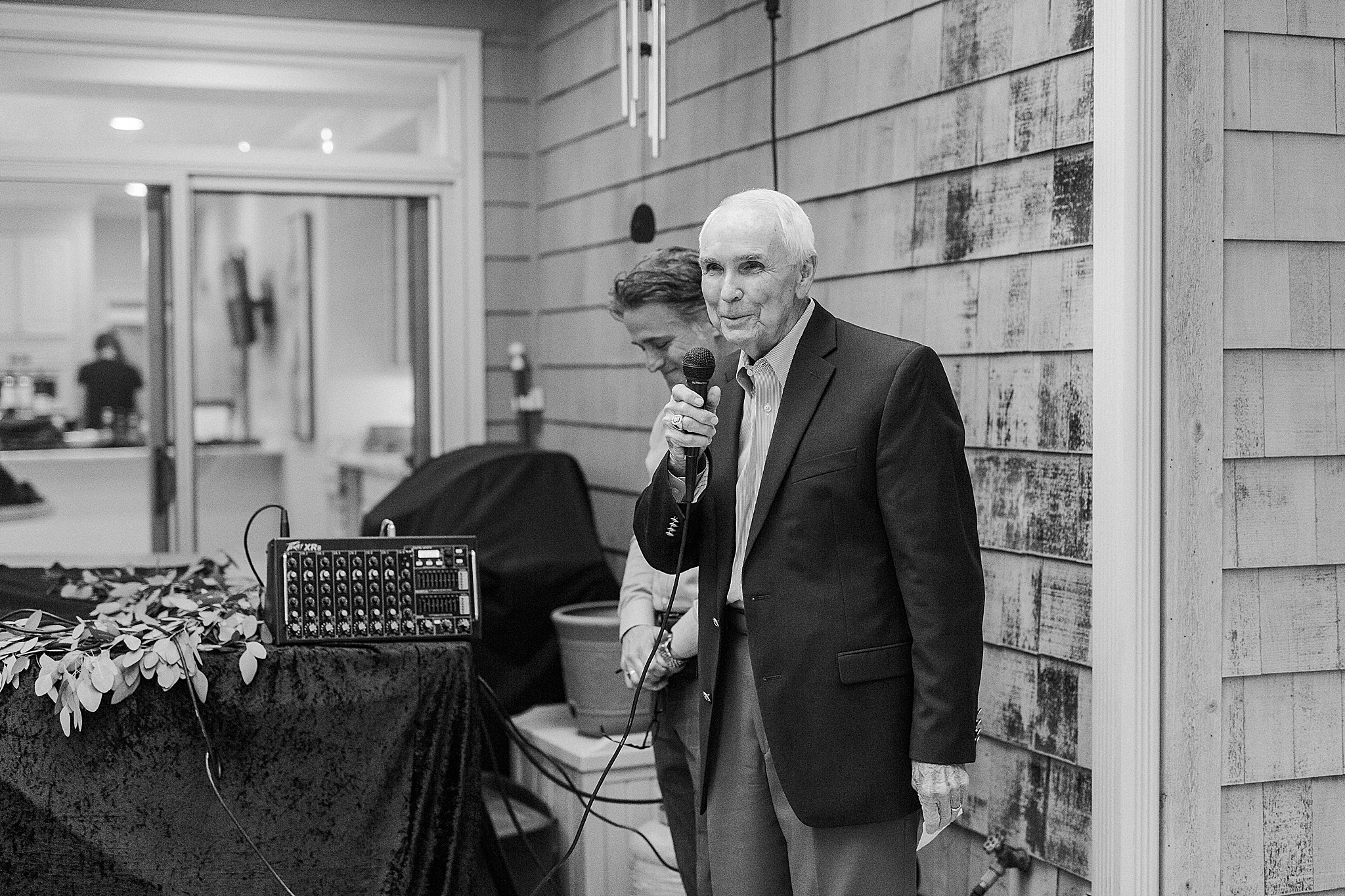 father gives toast during Charlotte NC Rehearsal Dinner
