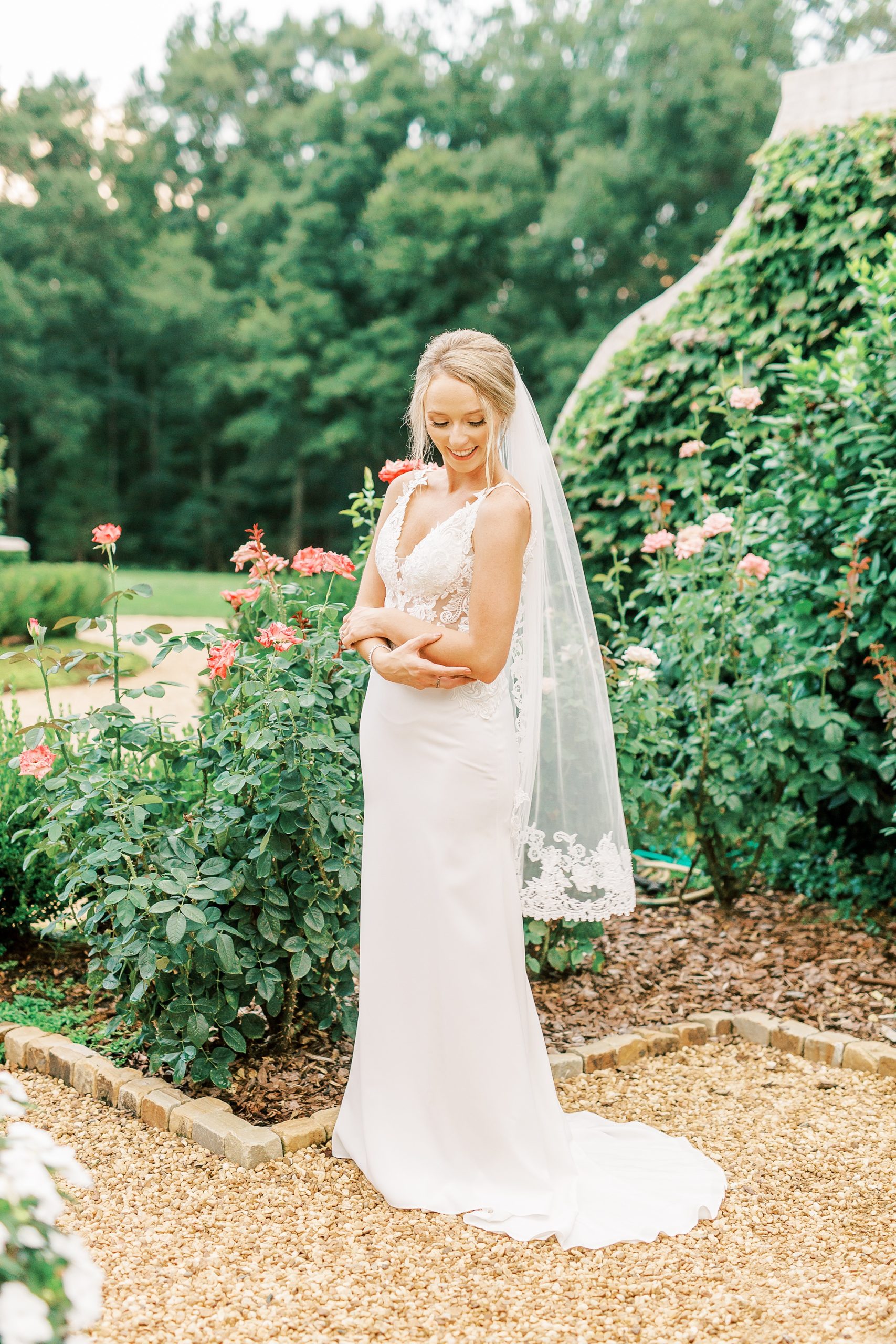 bride crosses arms and looks over elbow