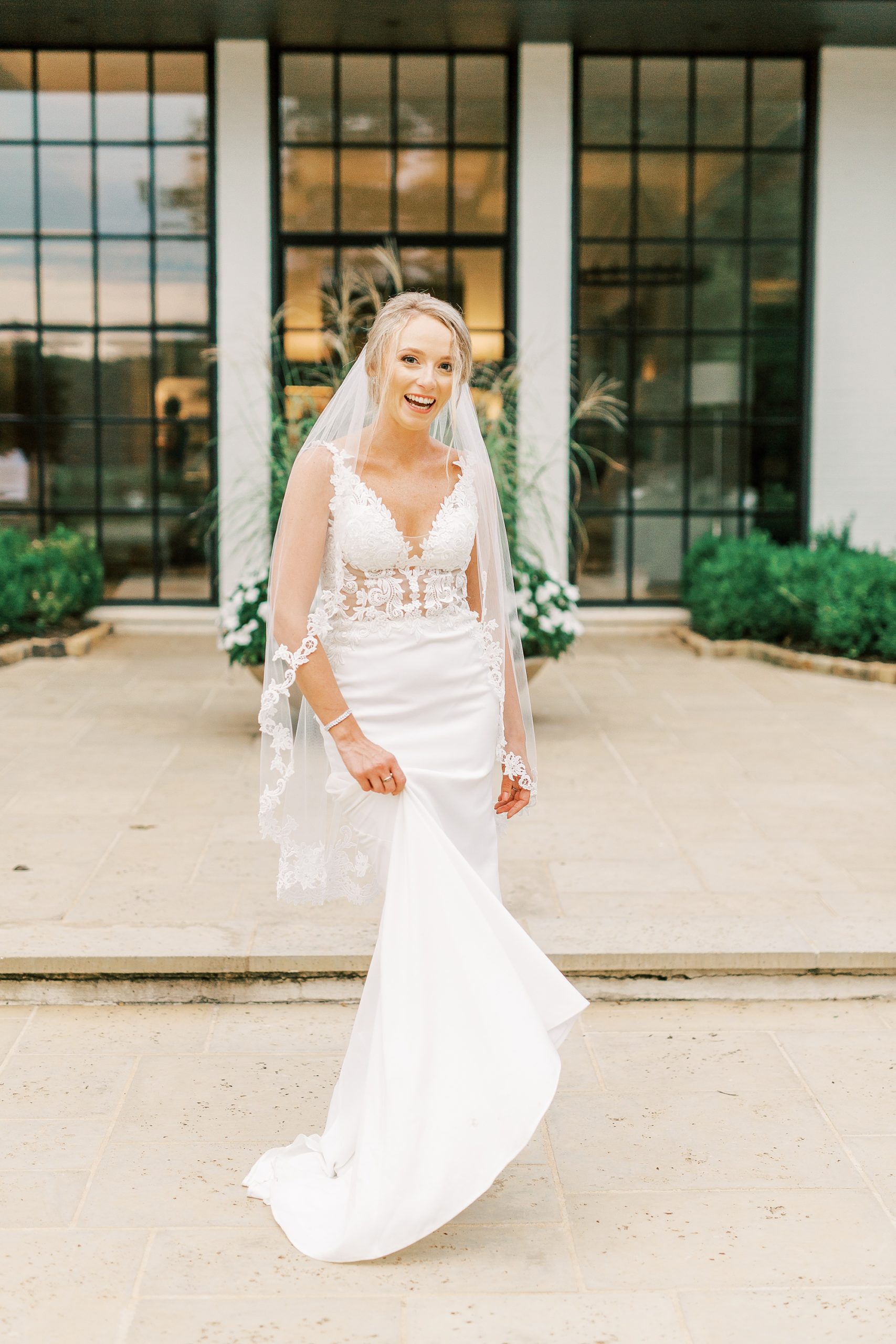 bride twirls wedding gown during bridals at The Andrews Farm