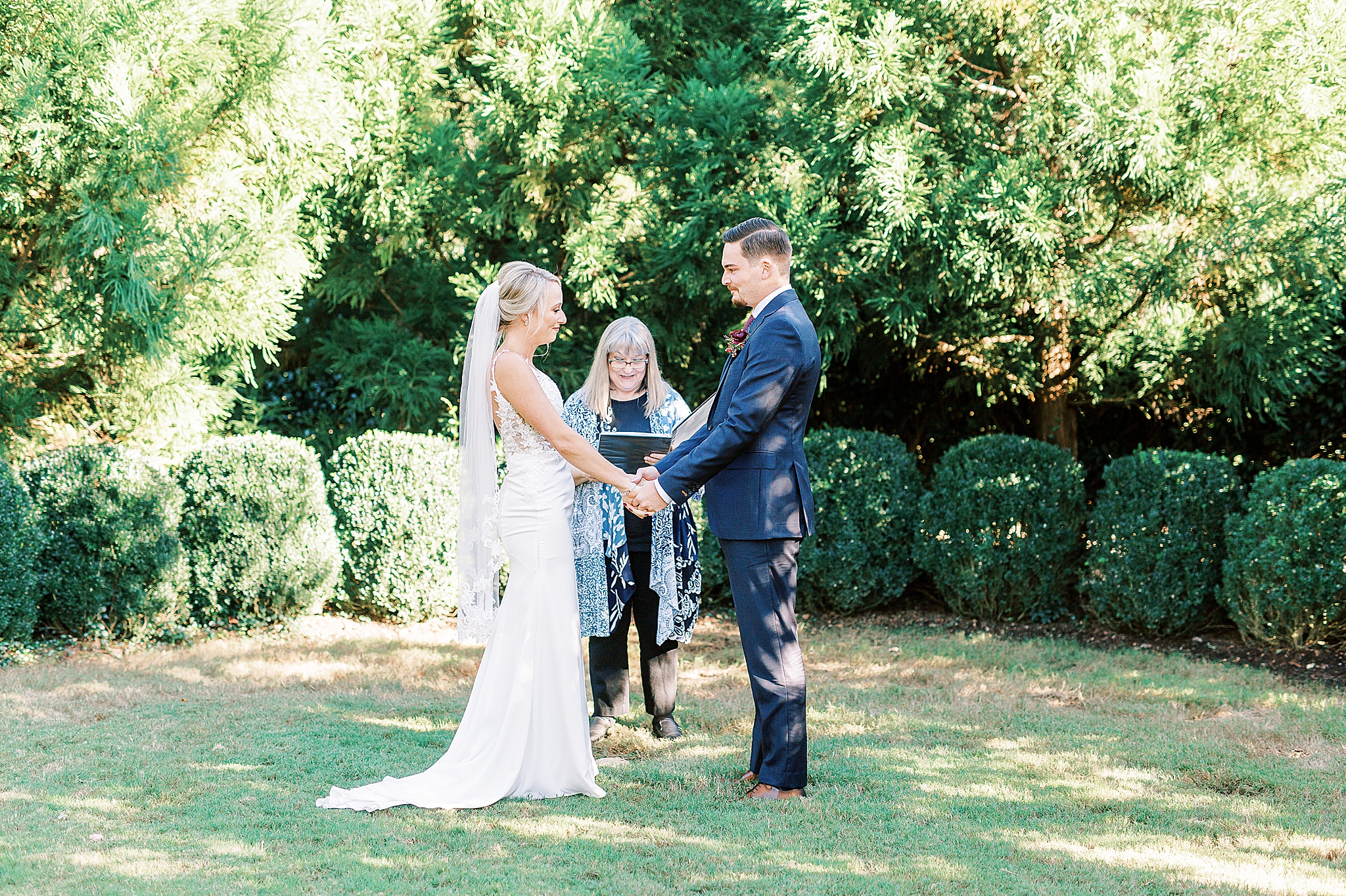 bride and groom exchange vows