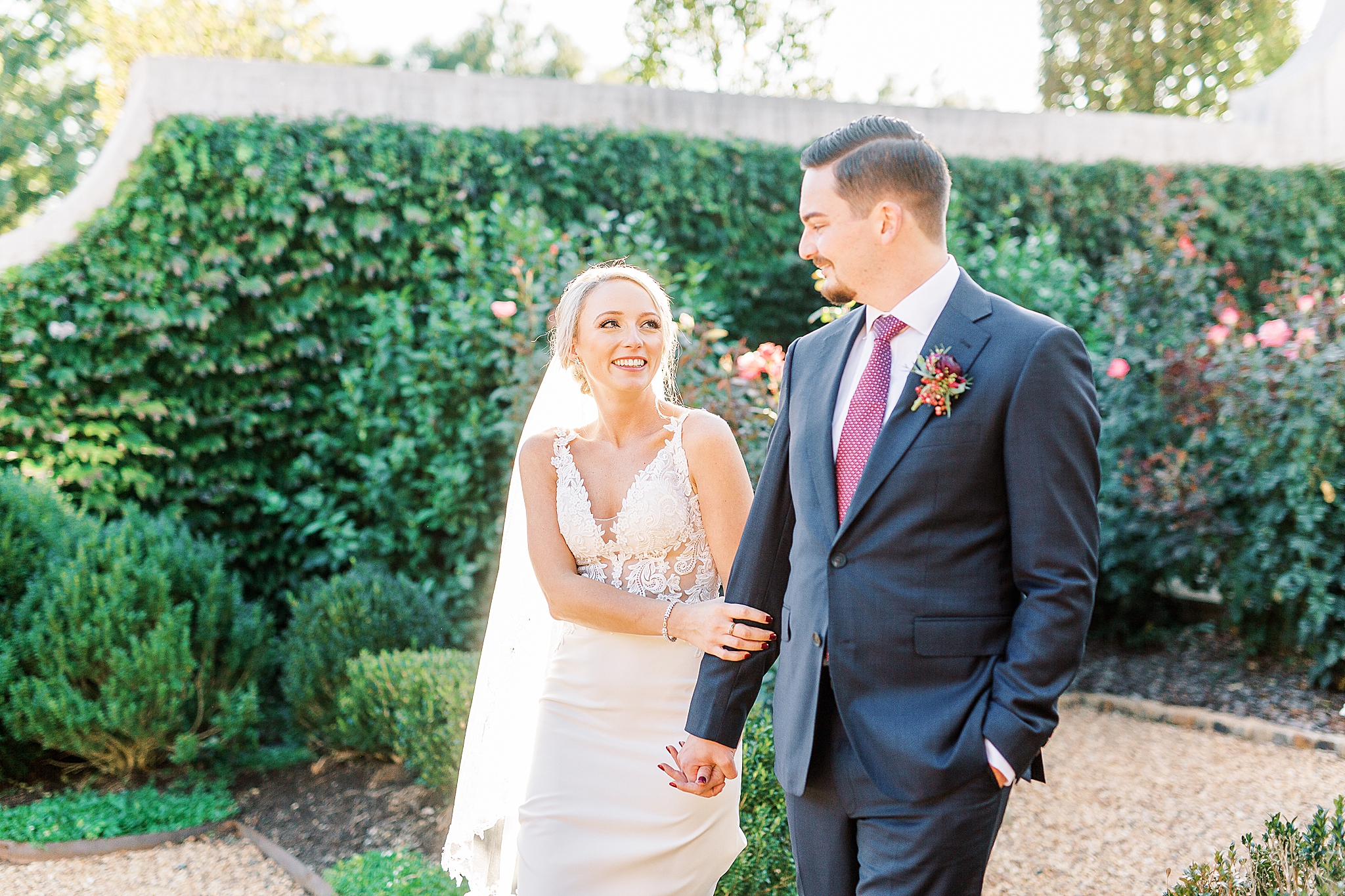 bride looks at groom during NC wedding photos