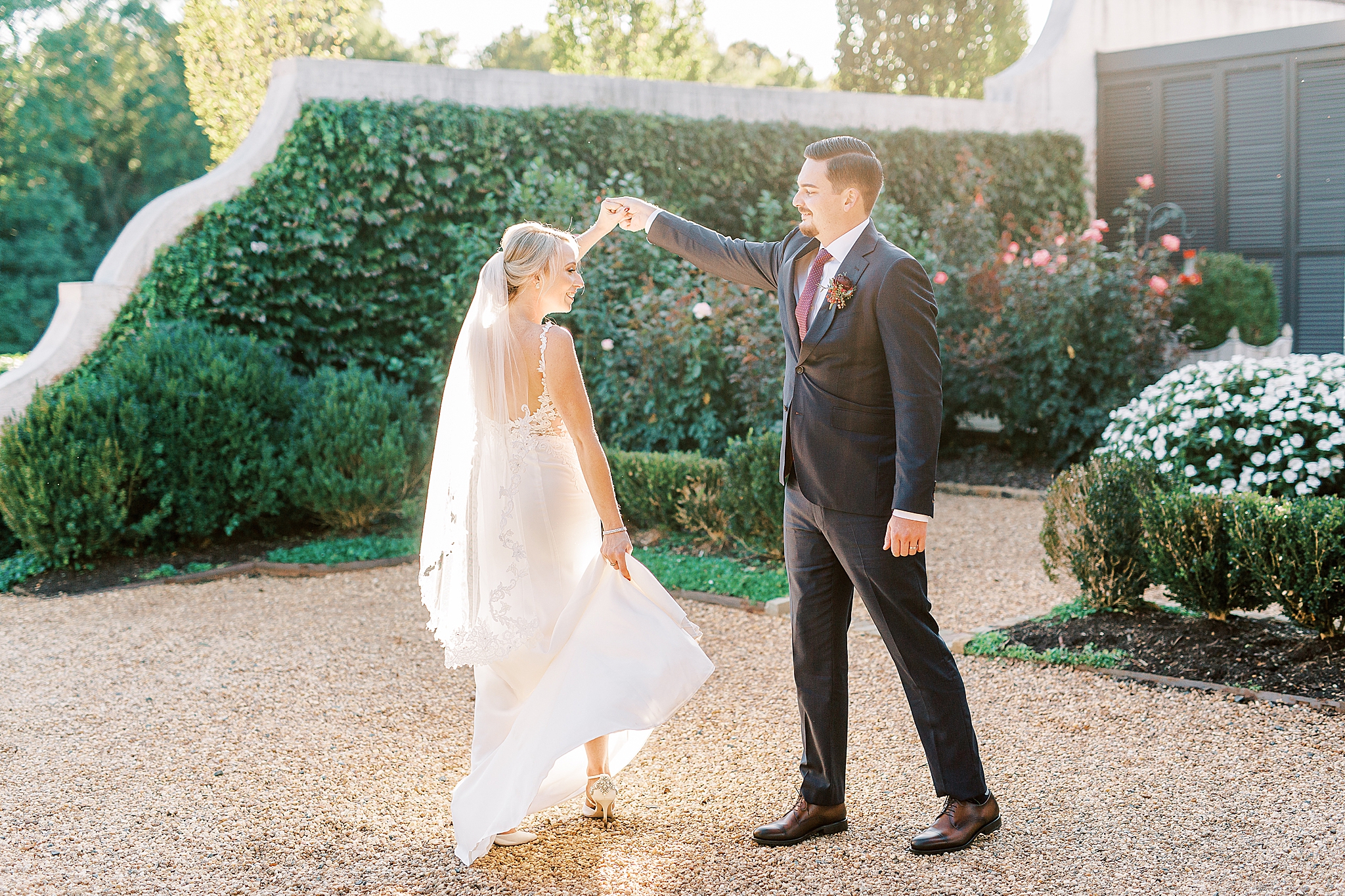 bride and groom dance in garden at The Andrews Farm