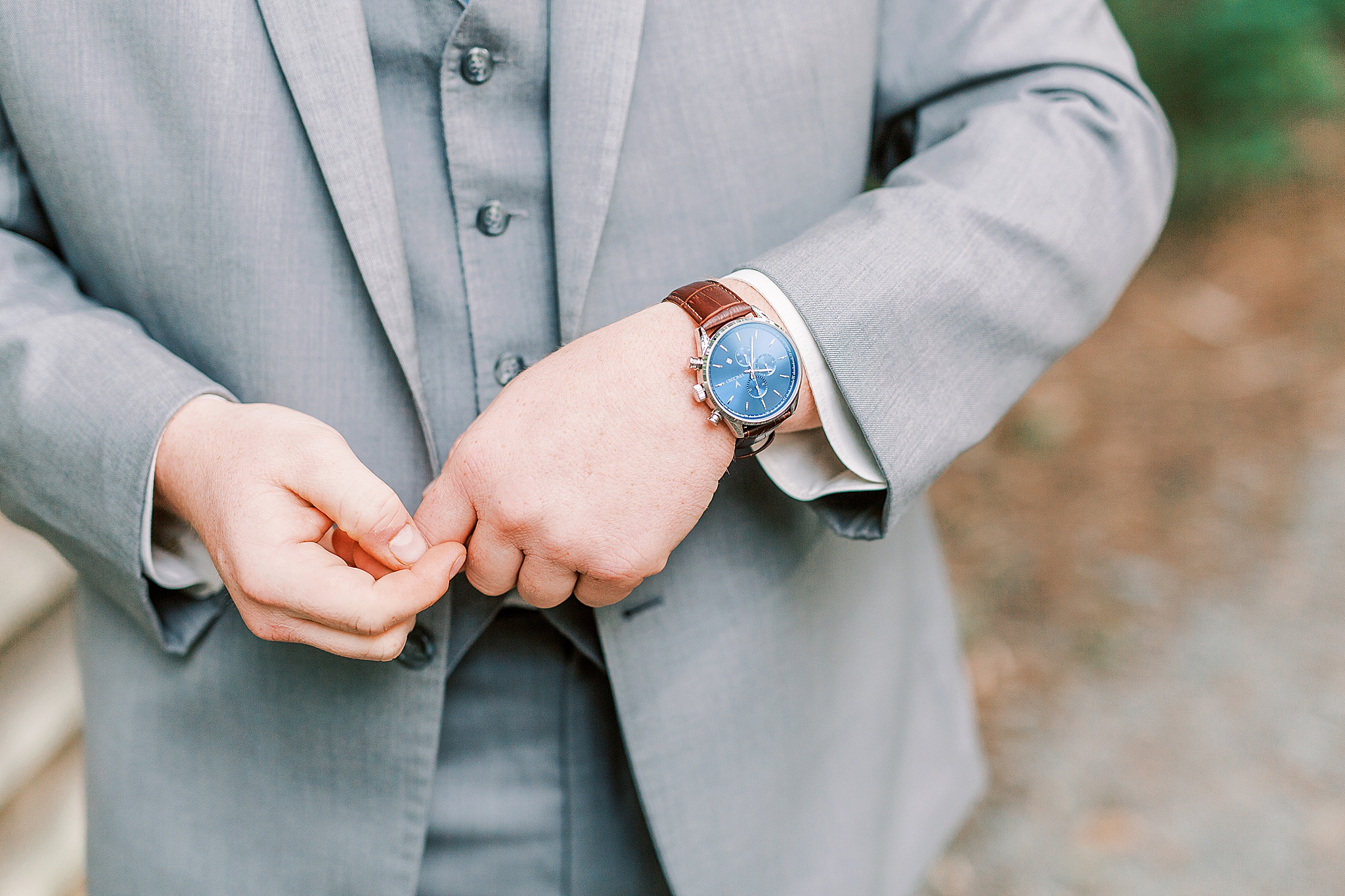 groom shows off new watch before wedding day