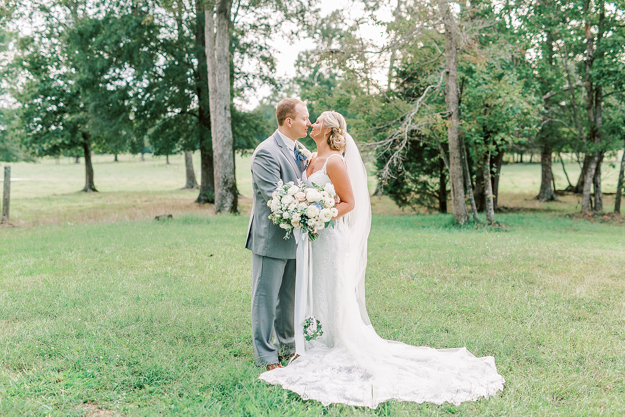 newlyweds pose together at the Farm at Brusharbor