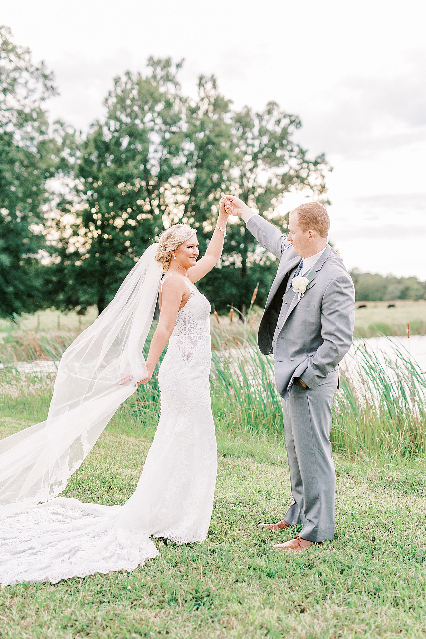 bride and groom dance along lake at The Farm at Brusharbor