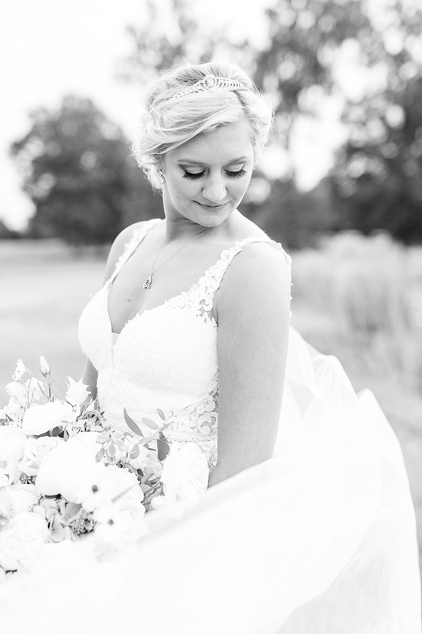 black and white bridal portrait of bride with Disney details