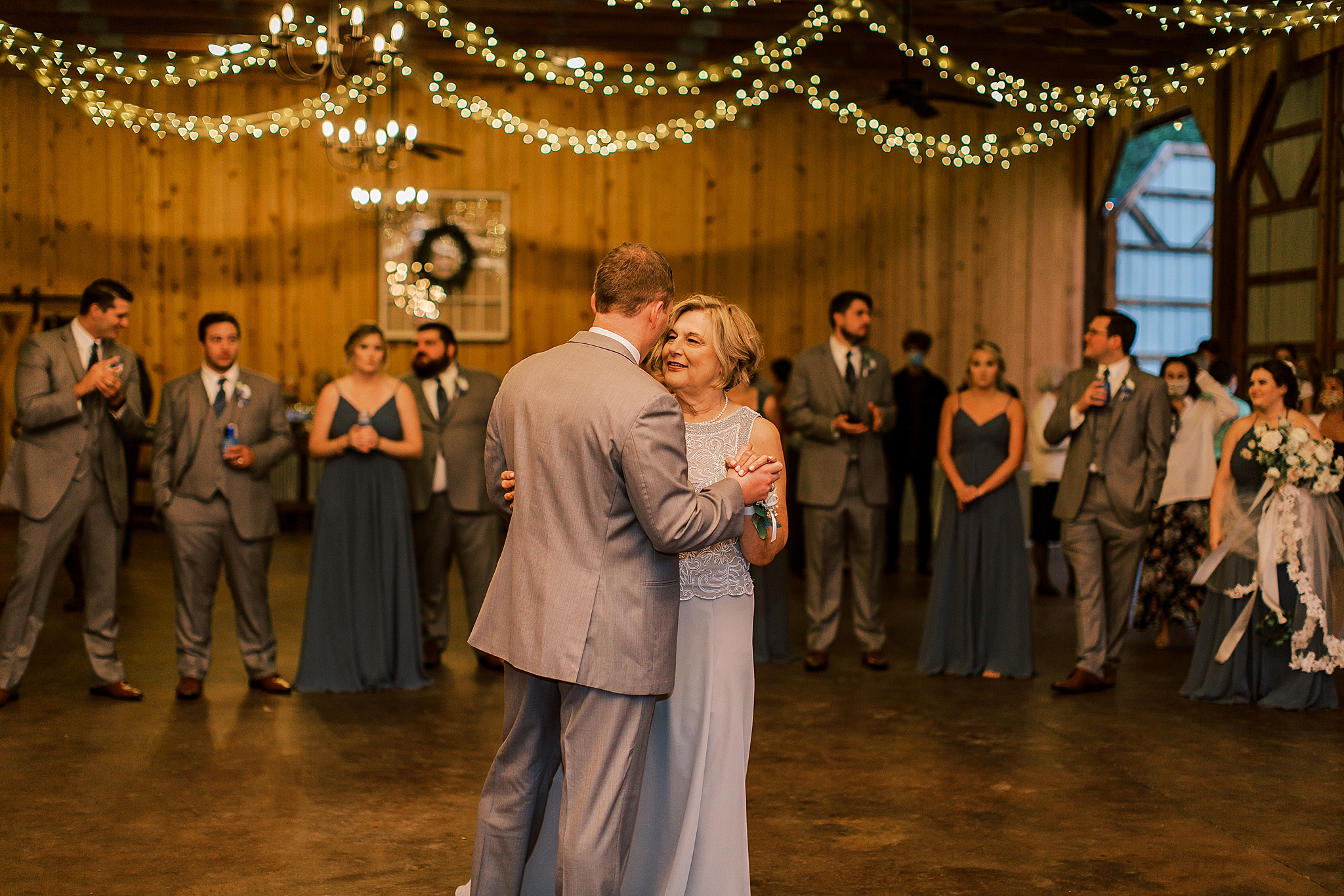 groom and mom dance during NC wedding reception