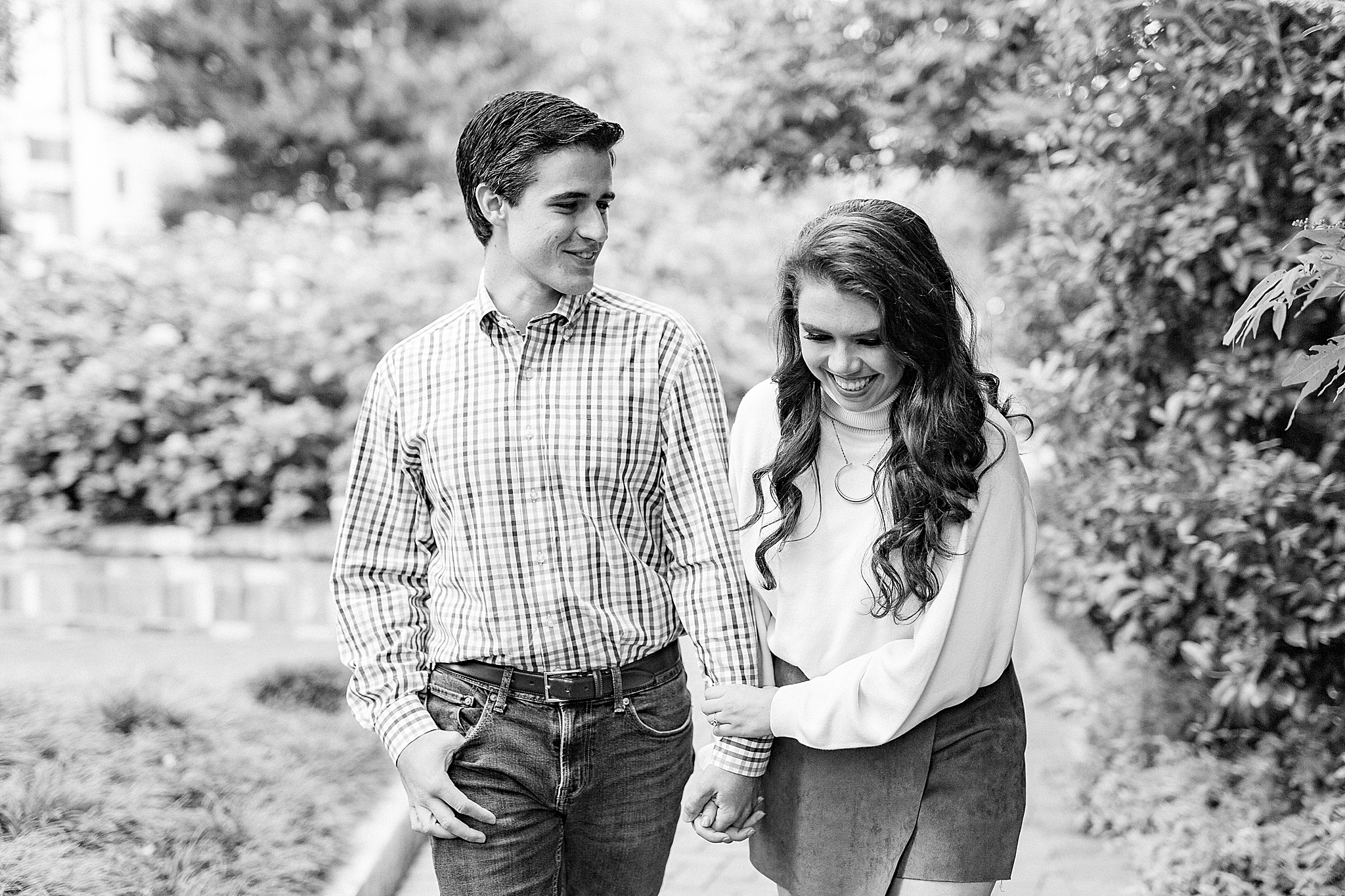 bride laughs during engagement photos in Charlotte NC