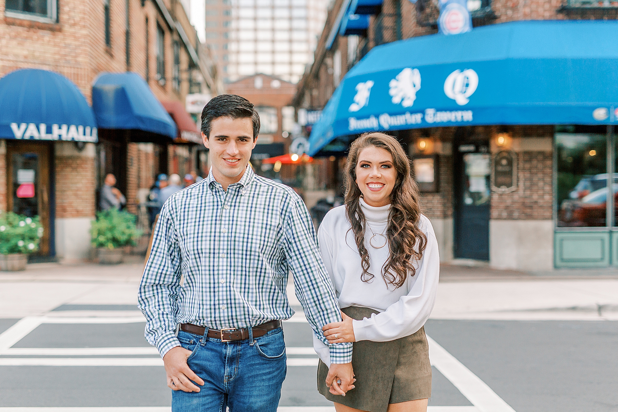 uptown Charlotte NC engagement portraits on street
