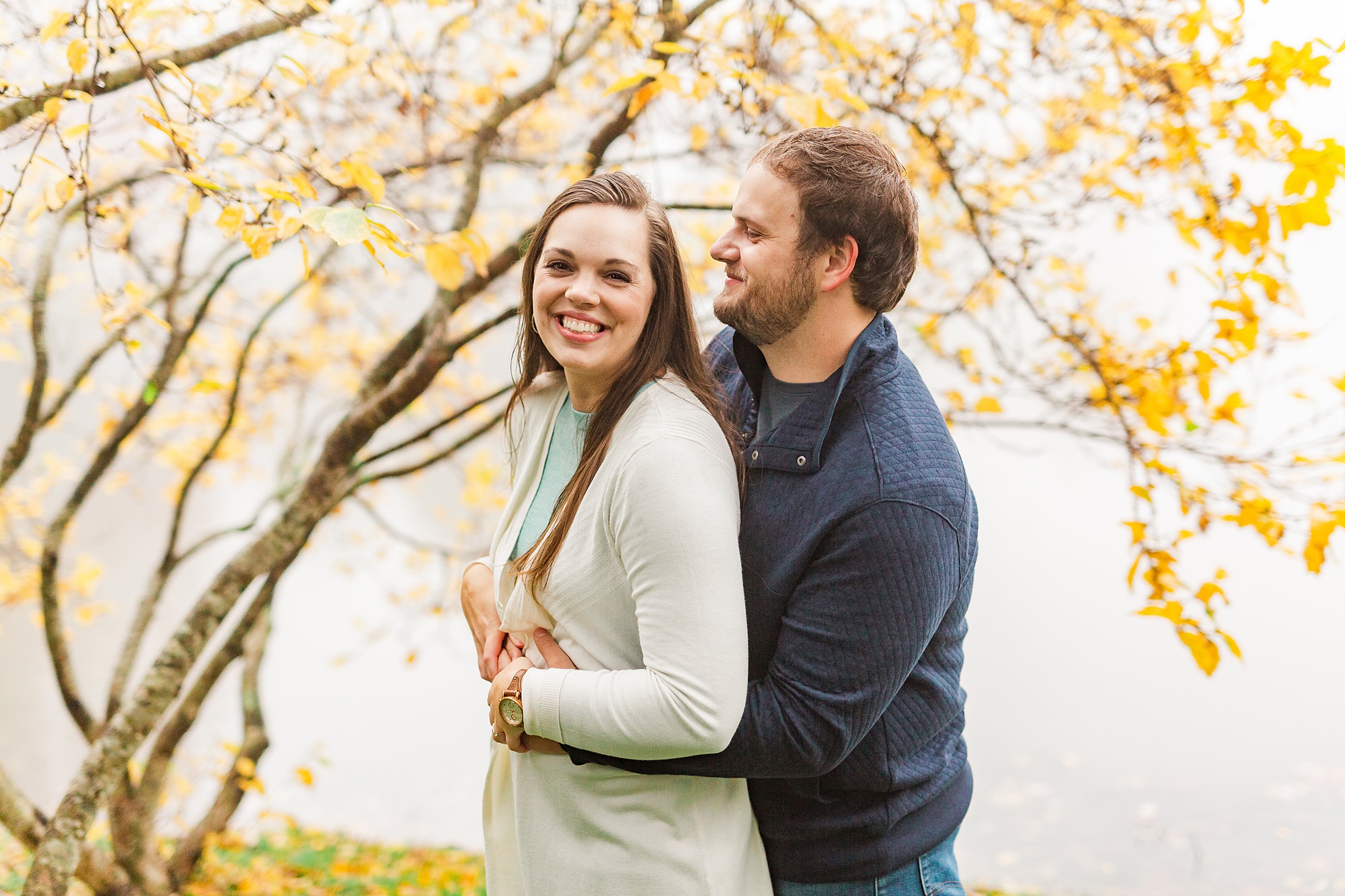 bride and groom laugh during NC engagement photos