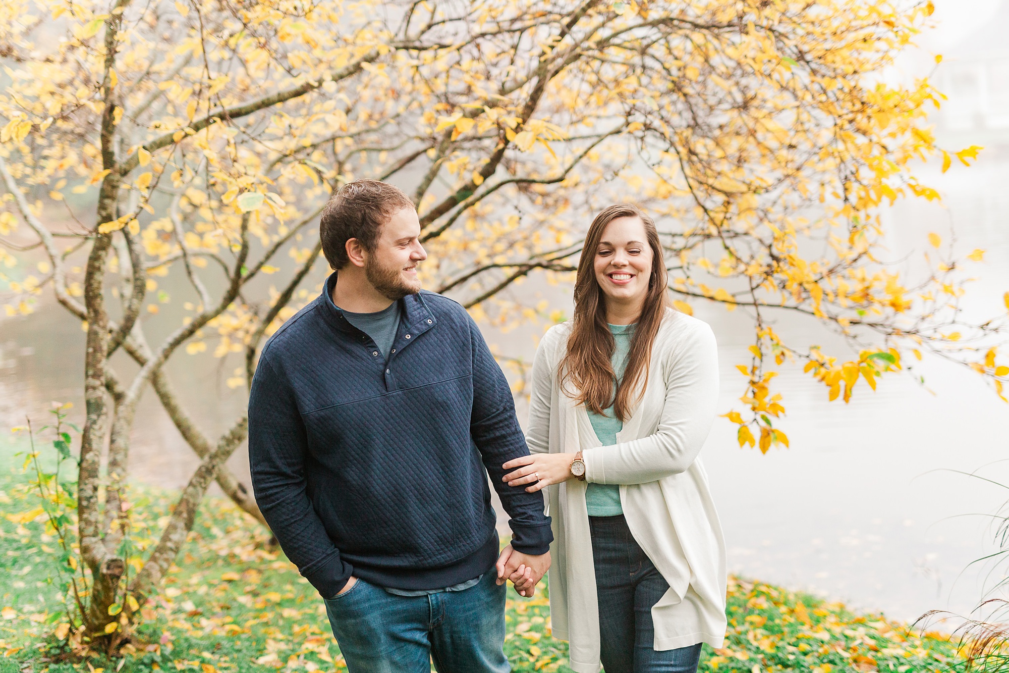 bride laughs during engagement photos with Kevyn Dixon Photography