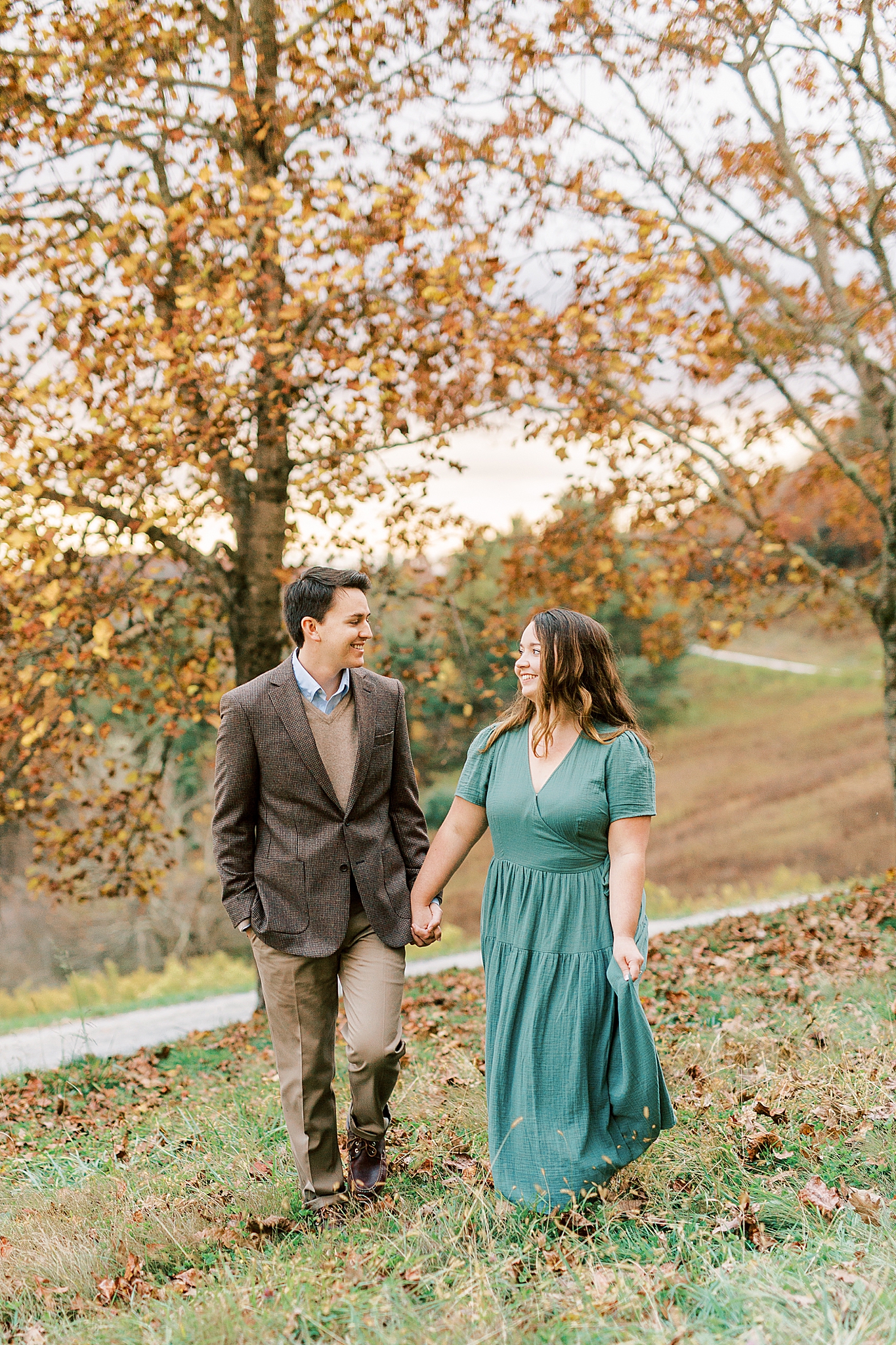 engagement portraits on mountain at sunset