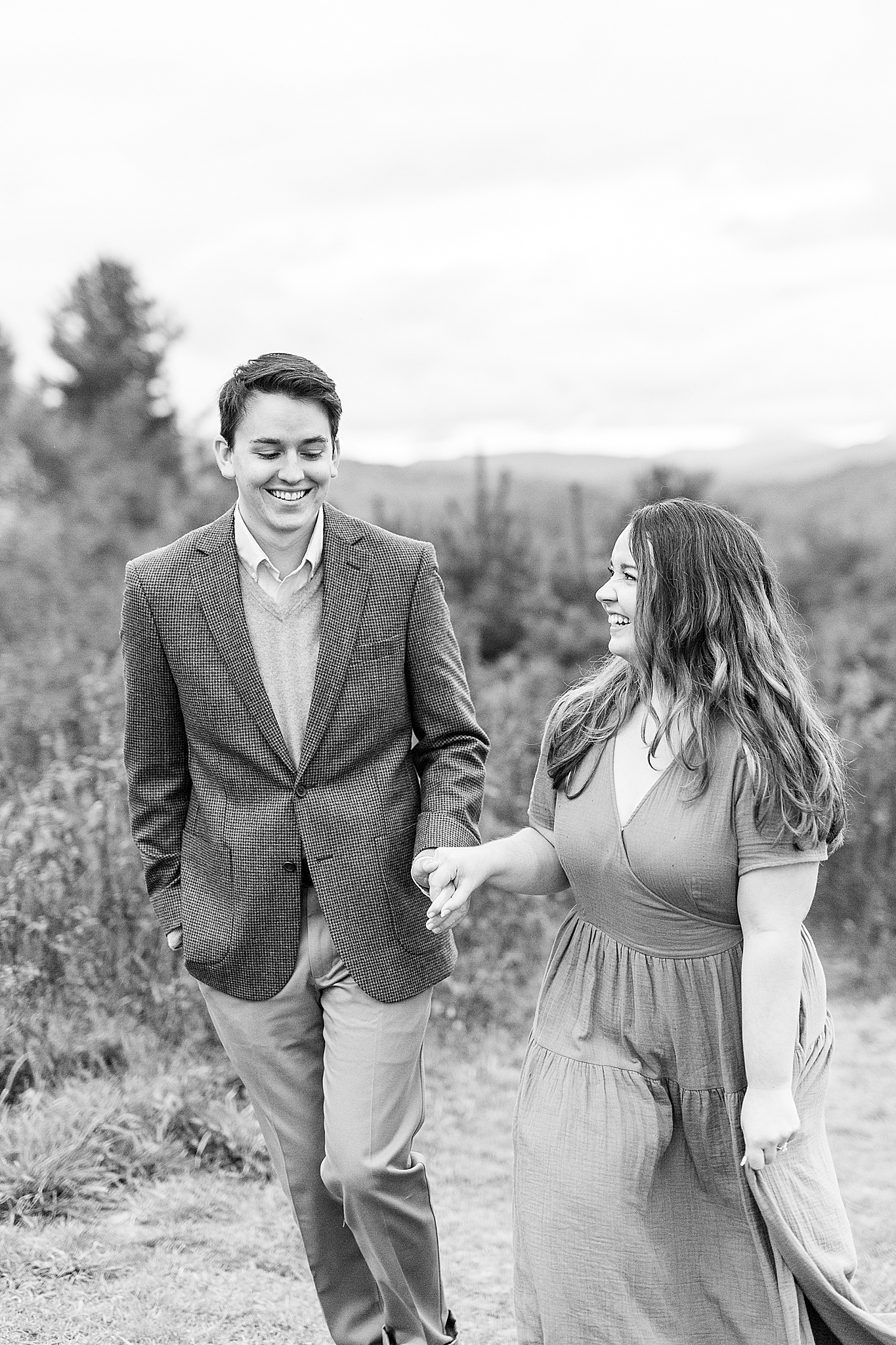 engaged couple walks along Thunder Hill Overlook