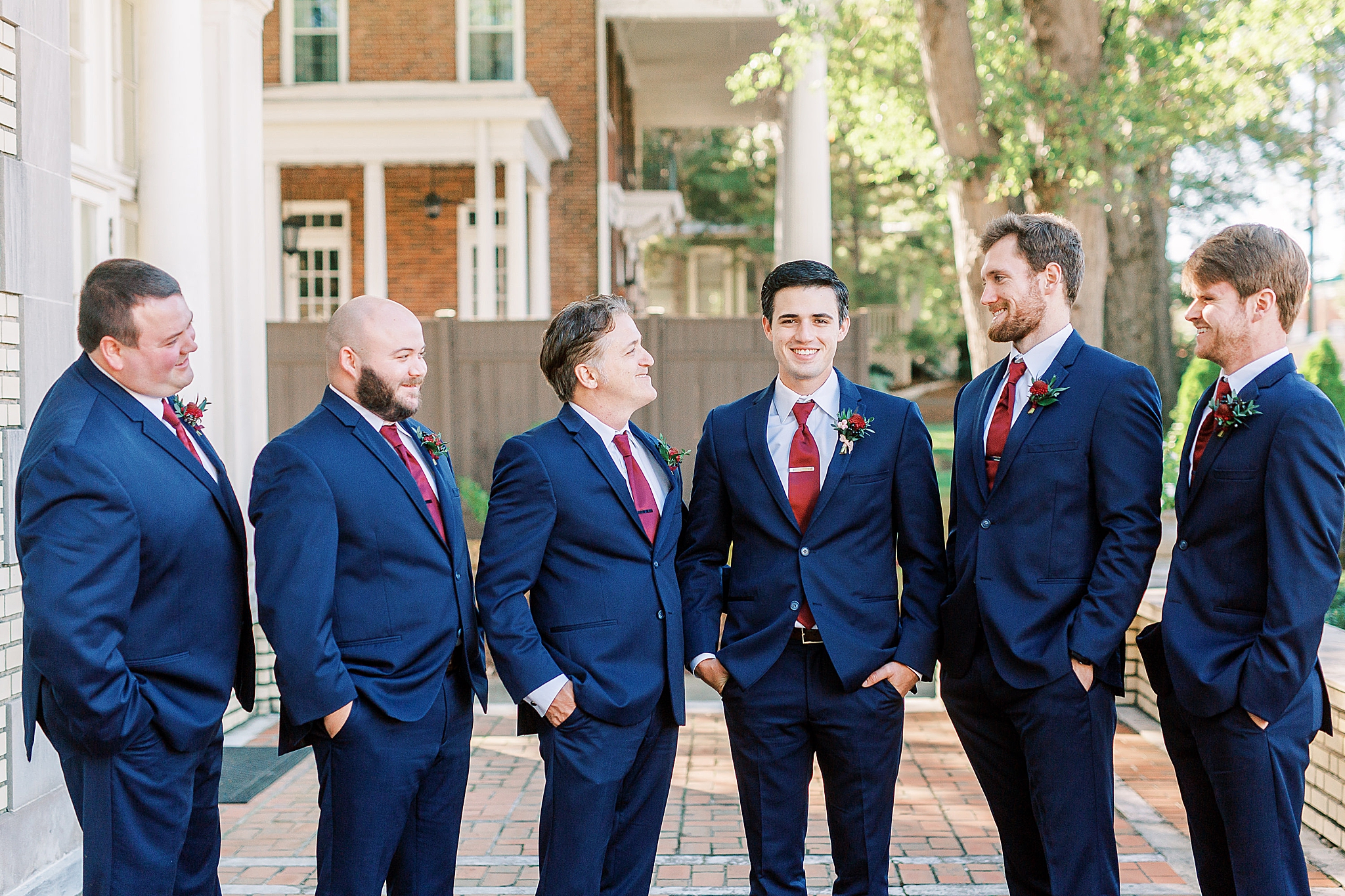 groomsmen pose before NC wedding day