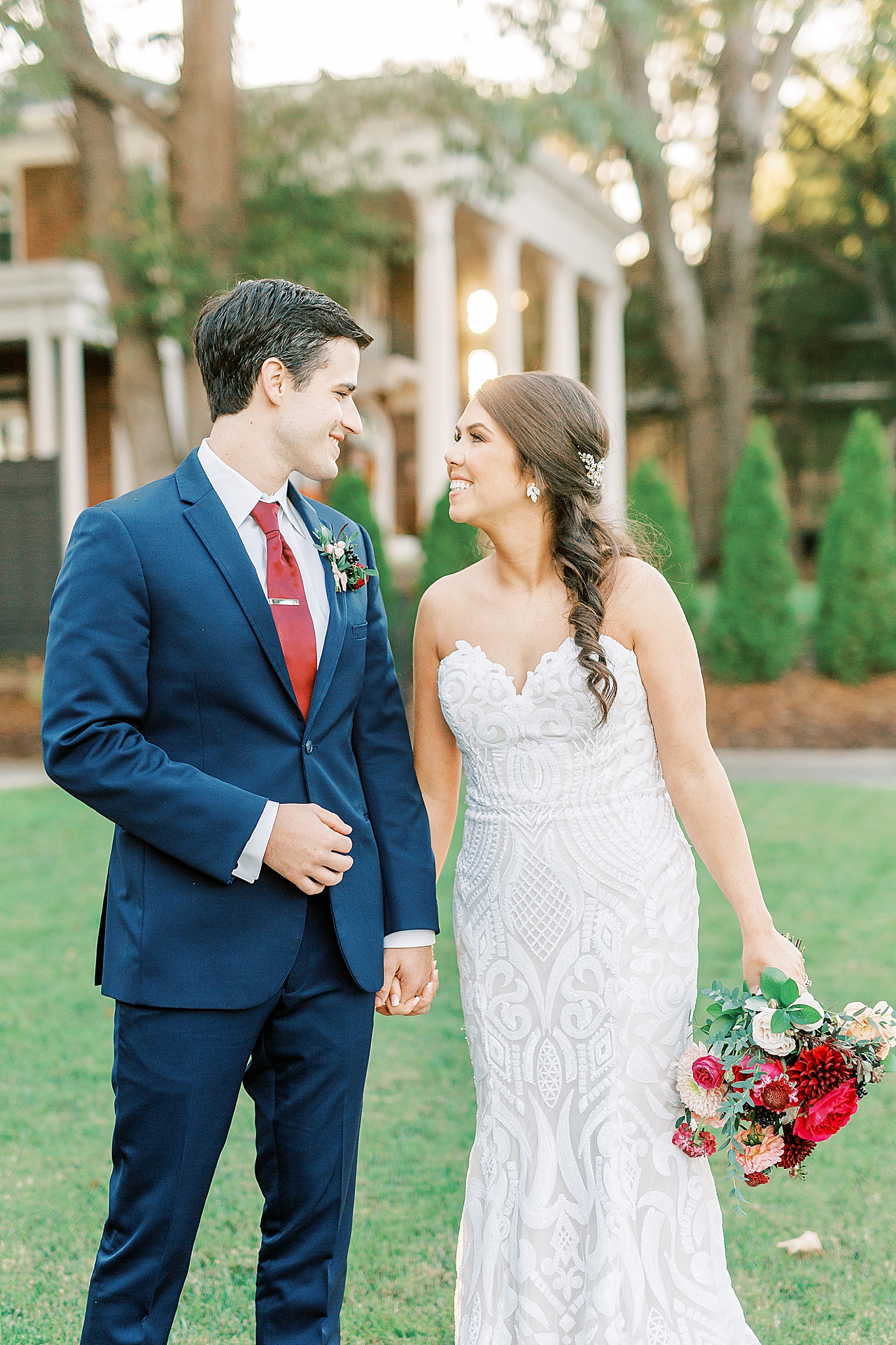 bride and groom walk through gardens at Separk Mansion