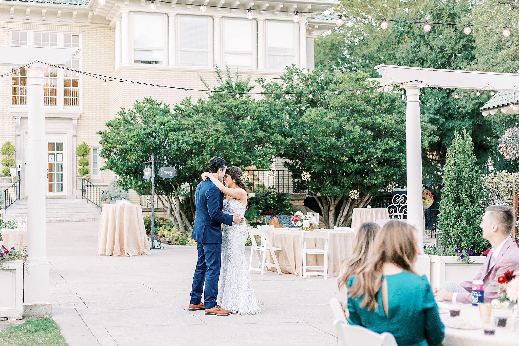 bride and groom's first dance at Separk Mansion garden reception