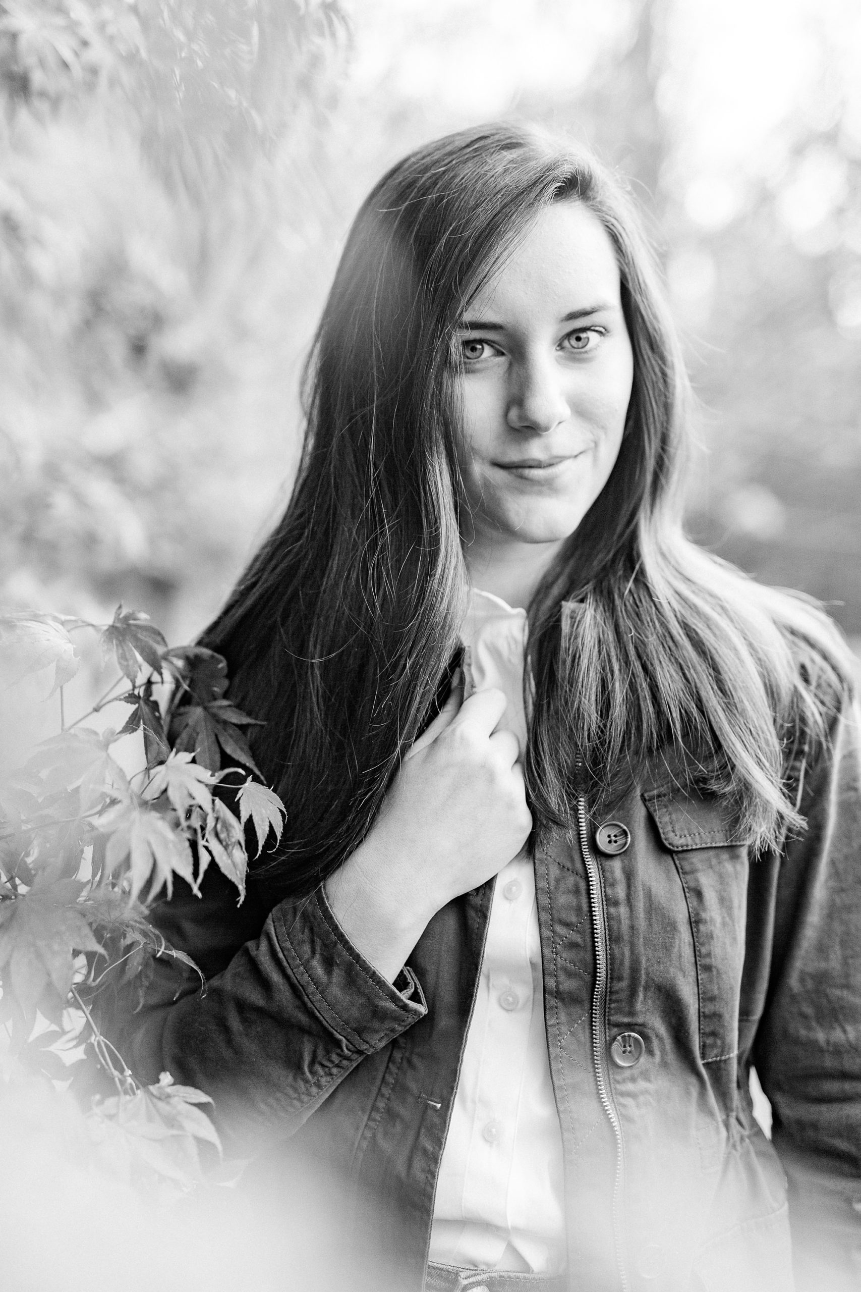 senior gives dramatic look to photographer during senior photos