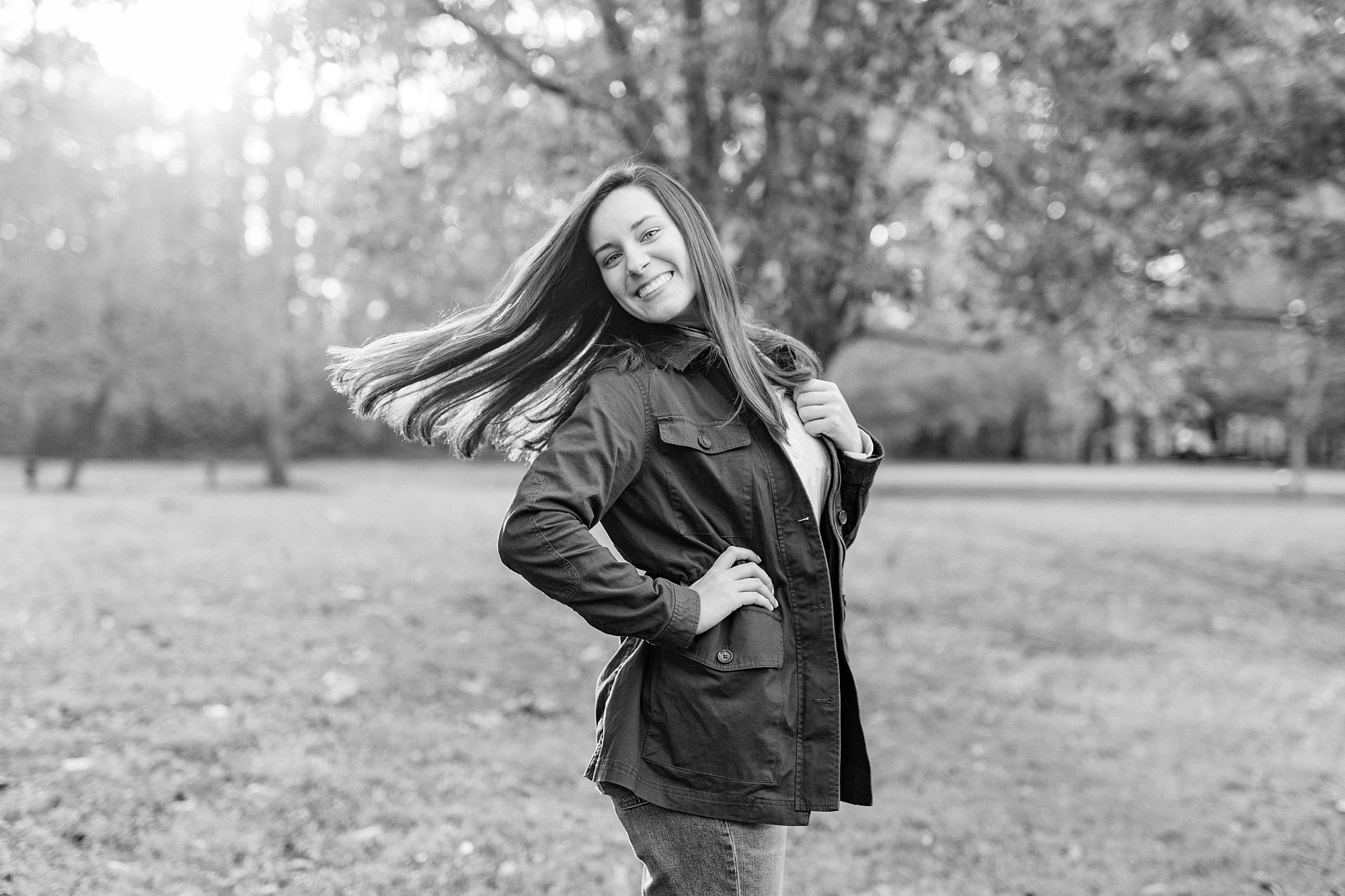 senior flips hair during photos at Sloan Park