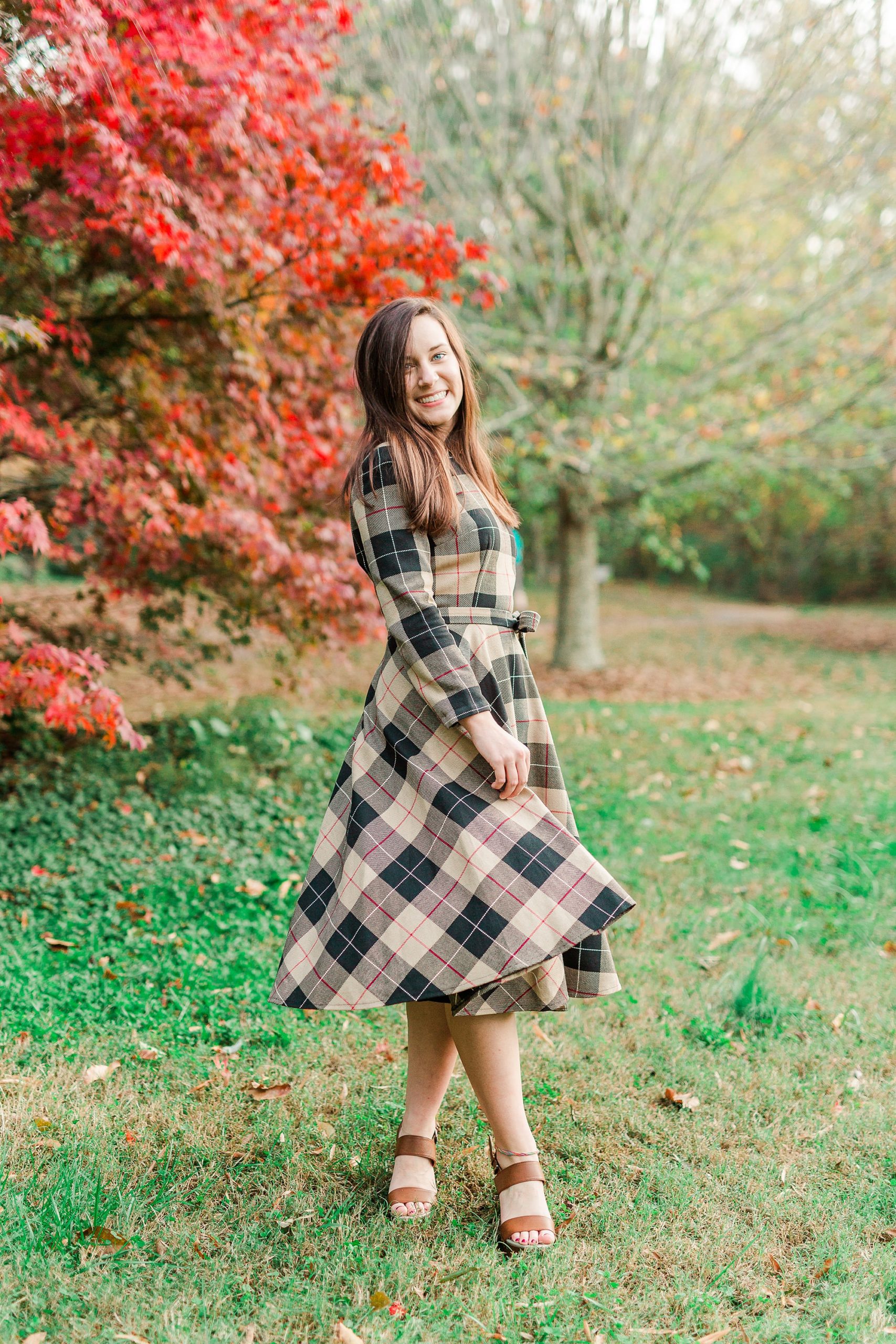 fall senior portraits at Sloan Park with custom gown