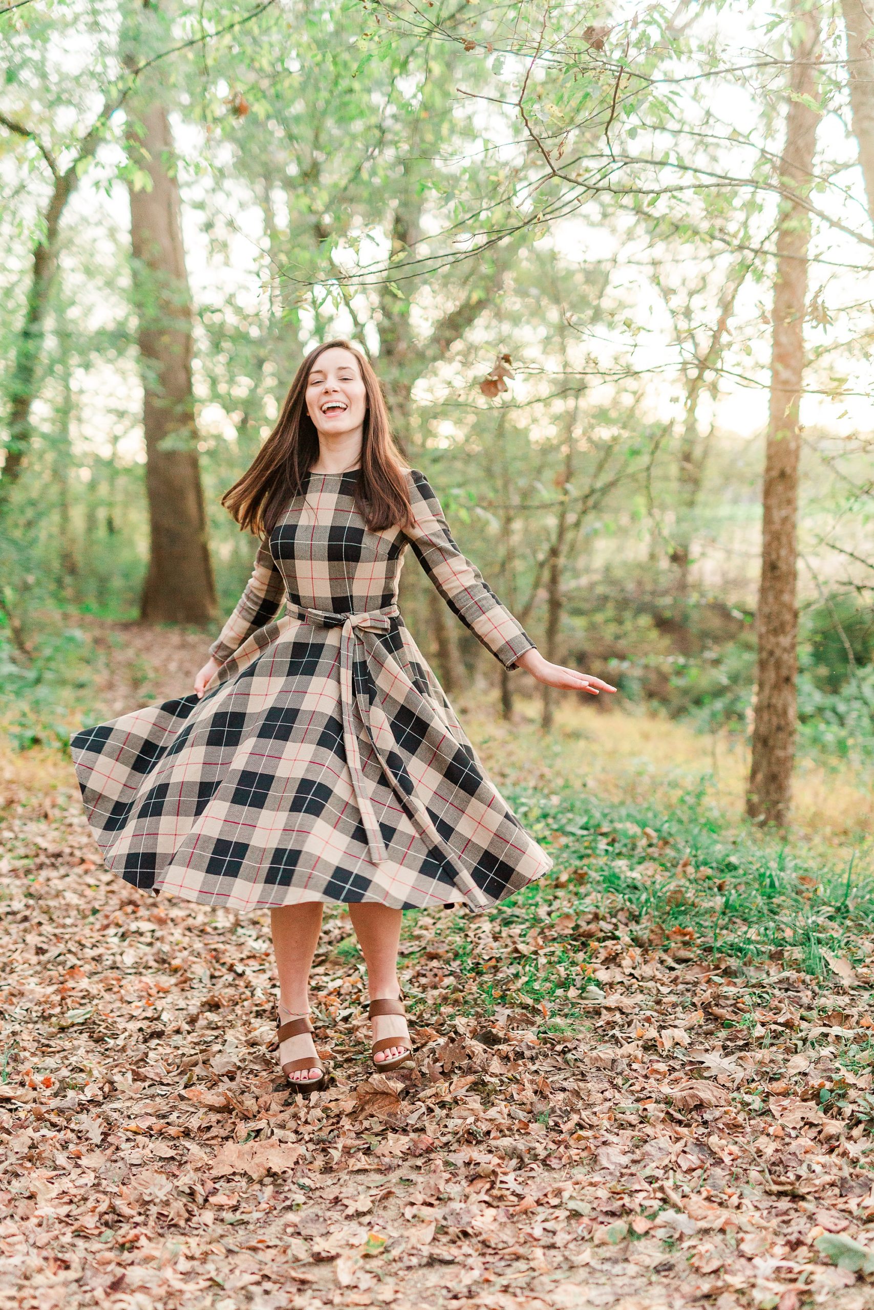 senior twirls in dress at Sloan Park