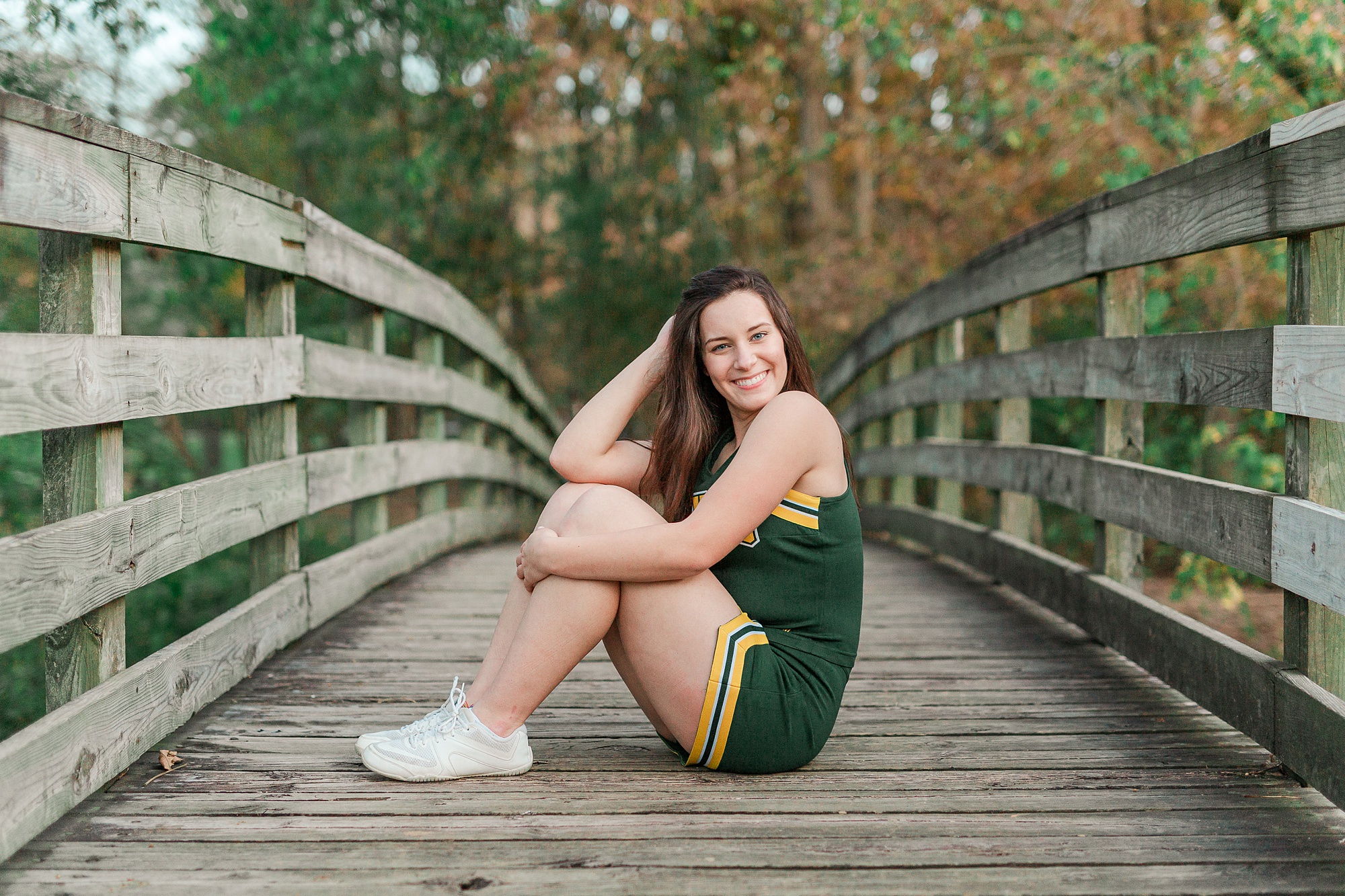 Sloan Park senior portraits of girl in cheerleading uniform