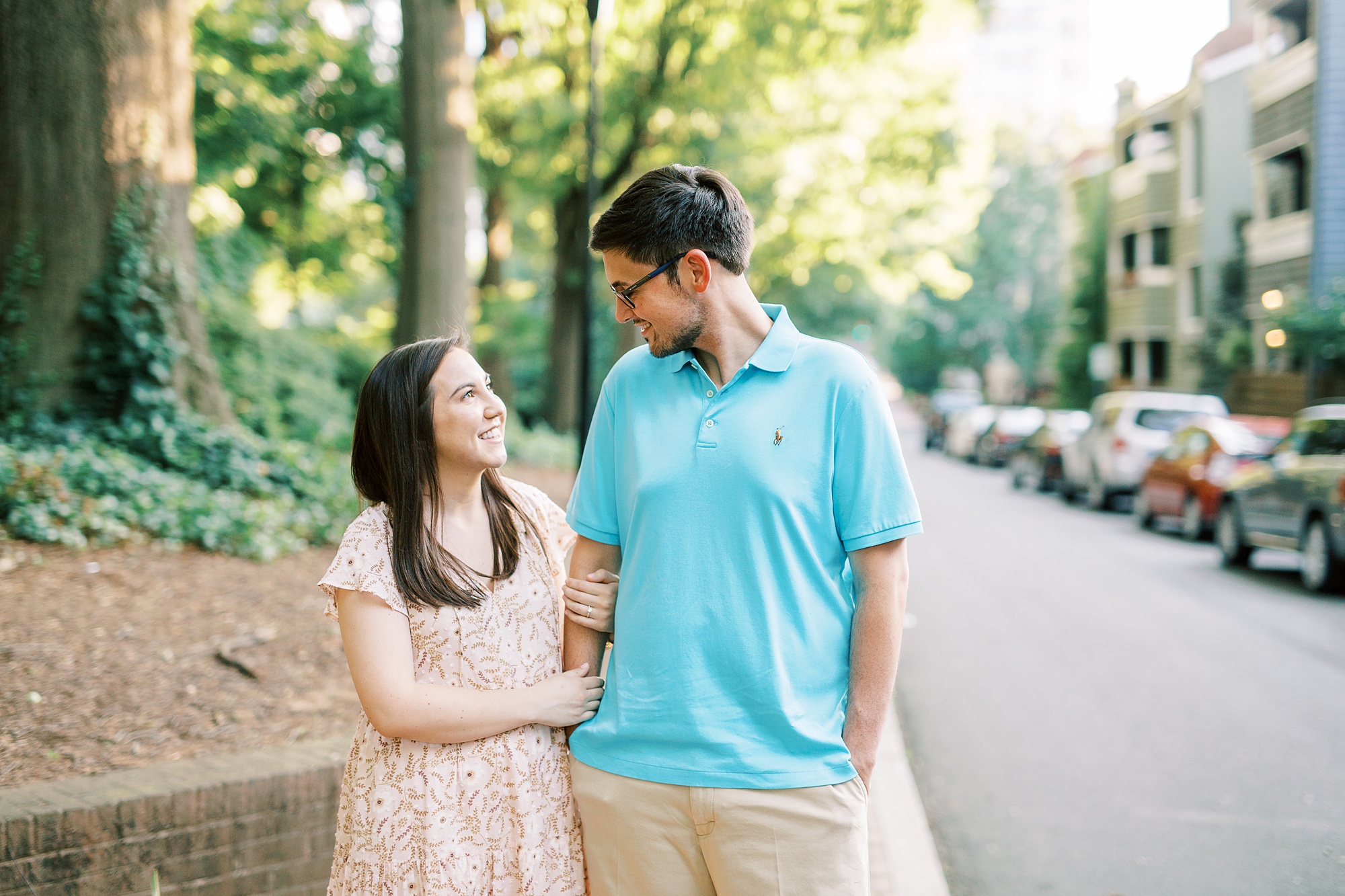 couple walks through Fourth Ward Park in Charlotte NC