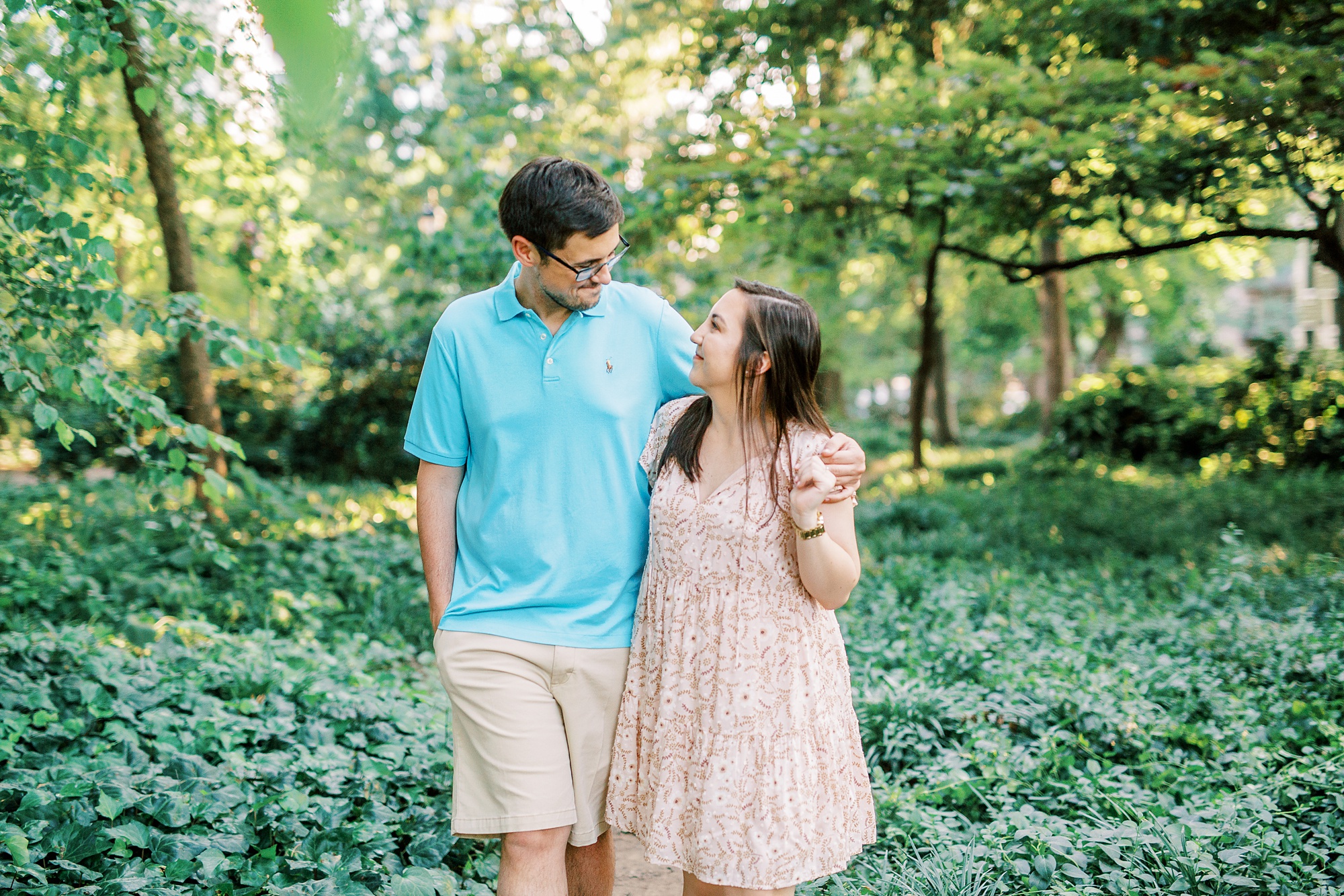bride and groom walk through Fourth Ward Park garden