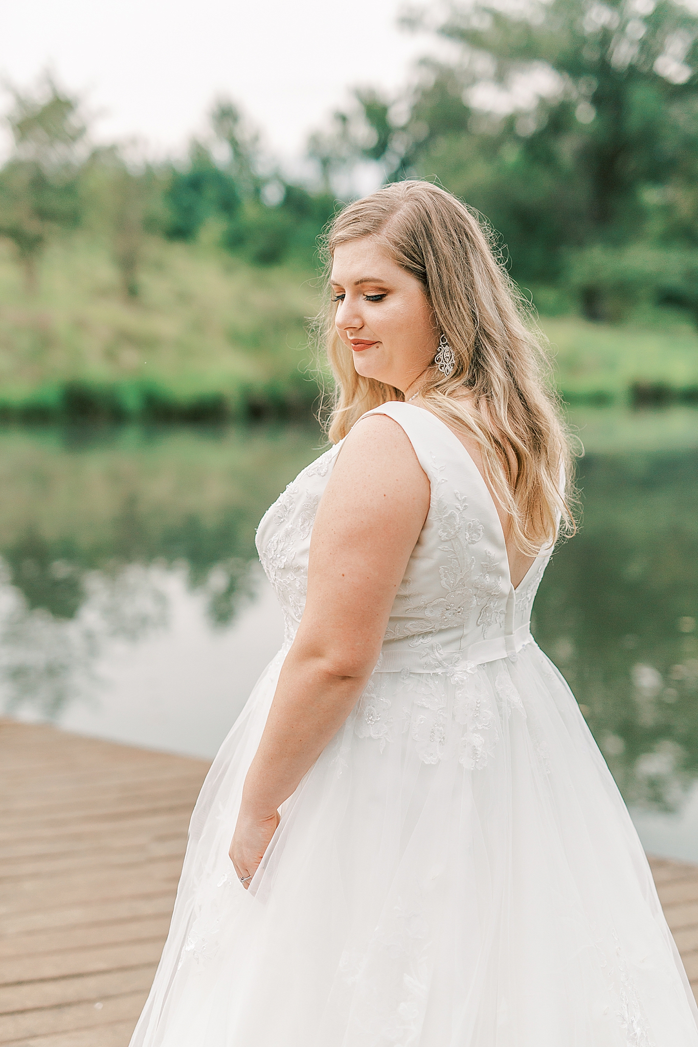 bride looks over her shoulder during bridal session