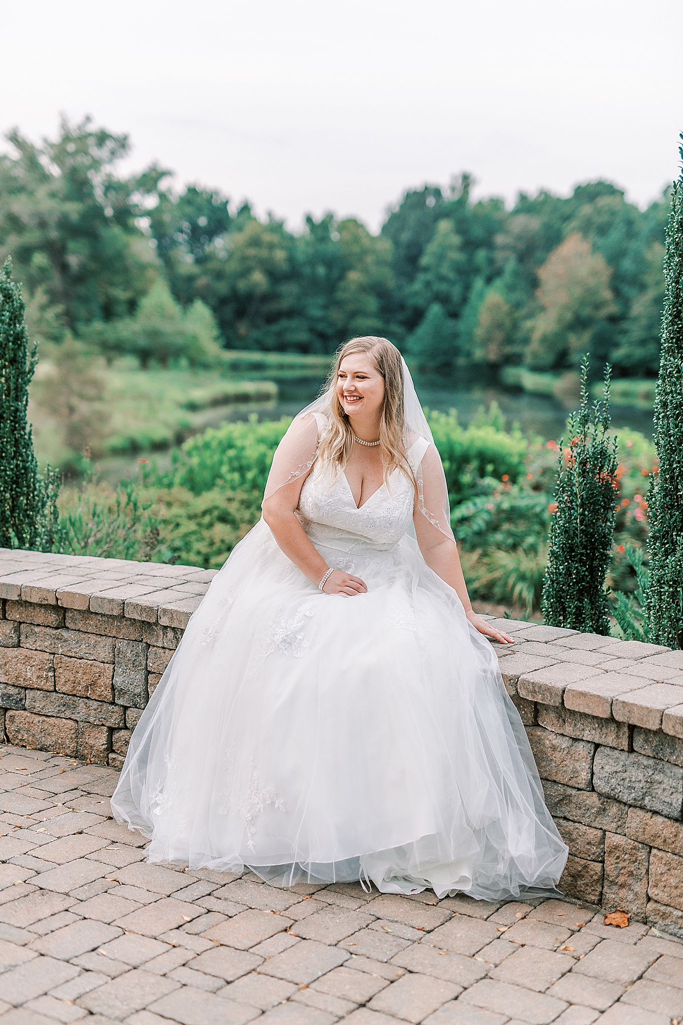 bride-to-be laughs during bridal session