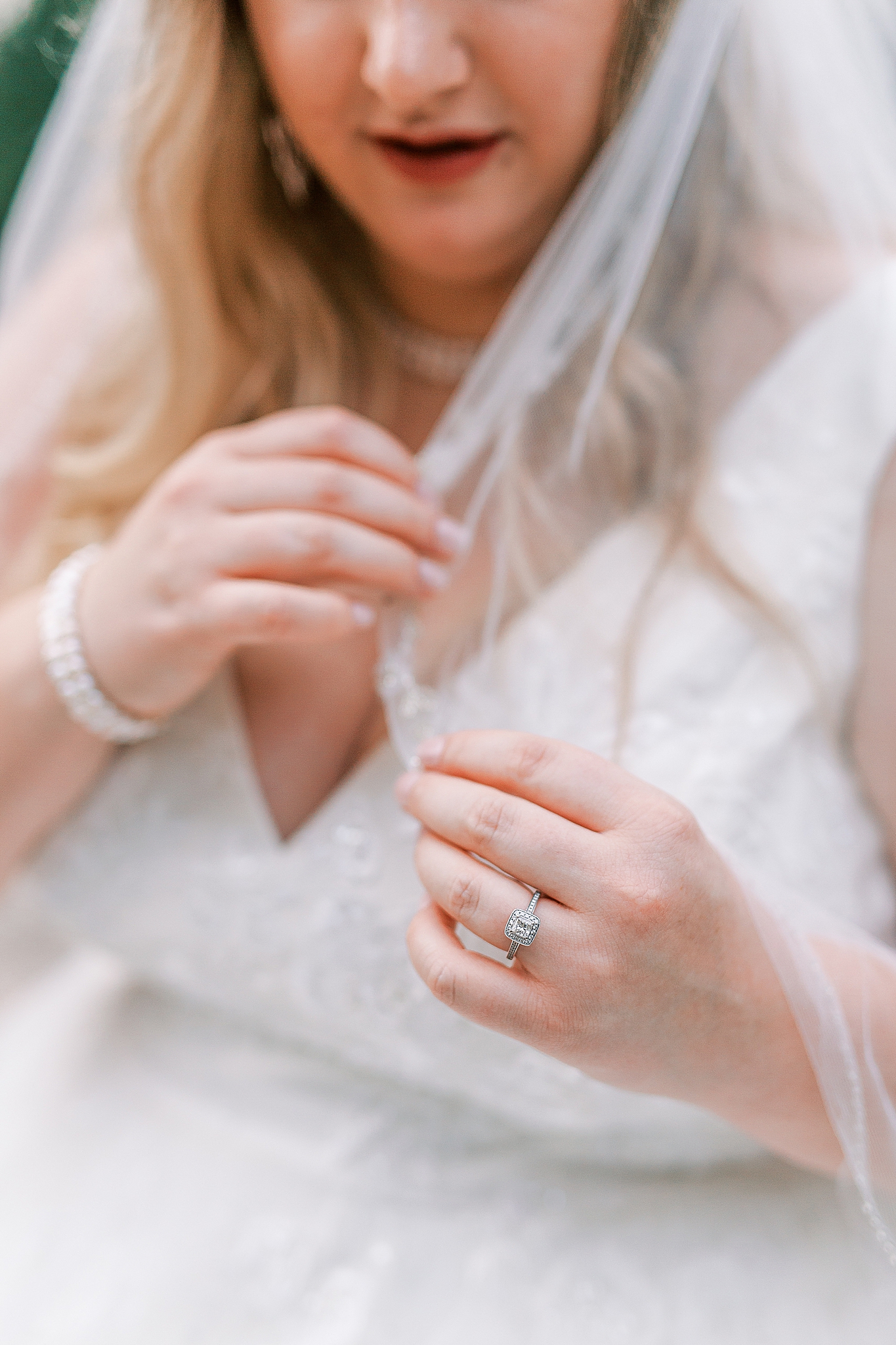 bride shows off engagement ring during The Arbors Bridal Portraits