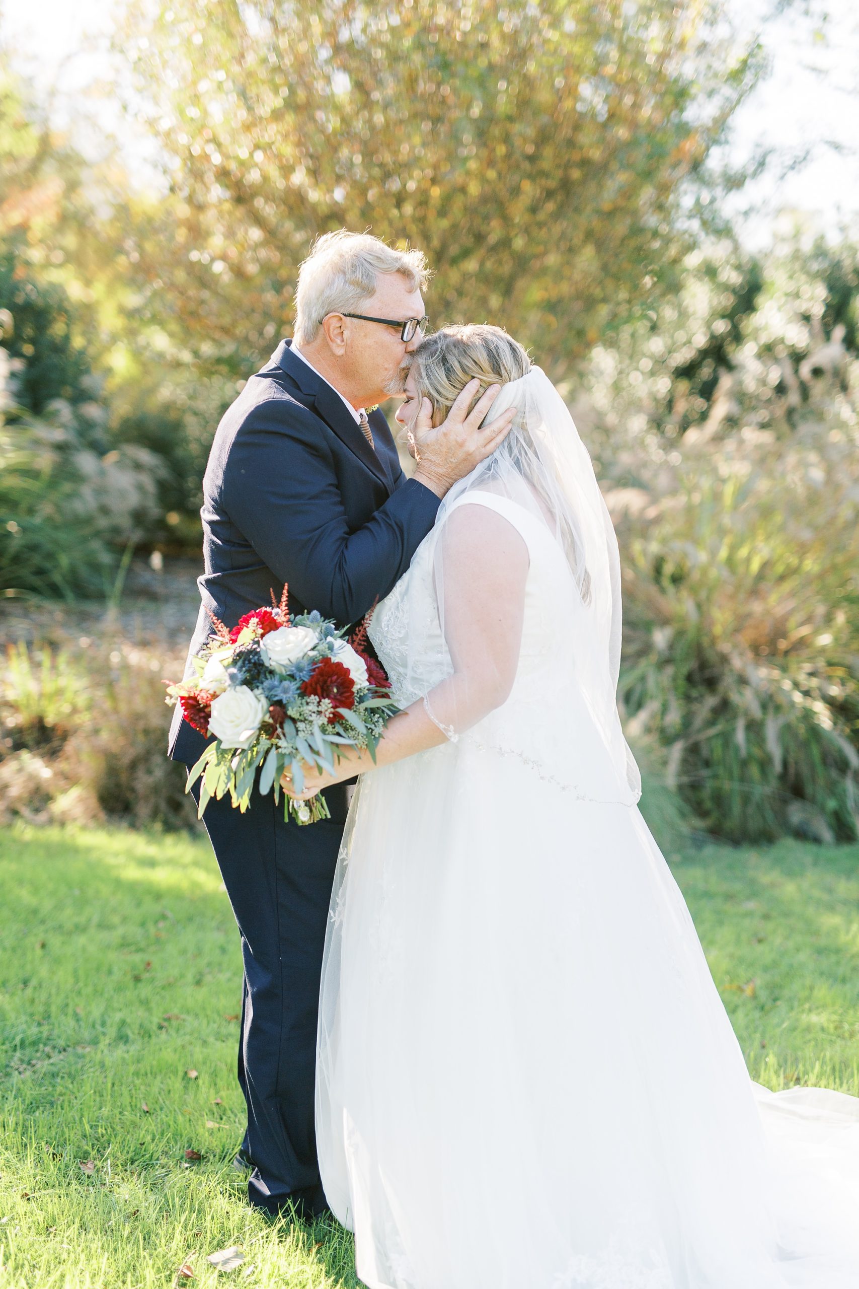 first look with dad and bride at Arbors Events