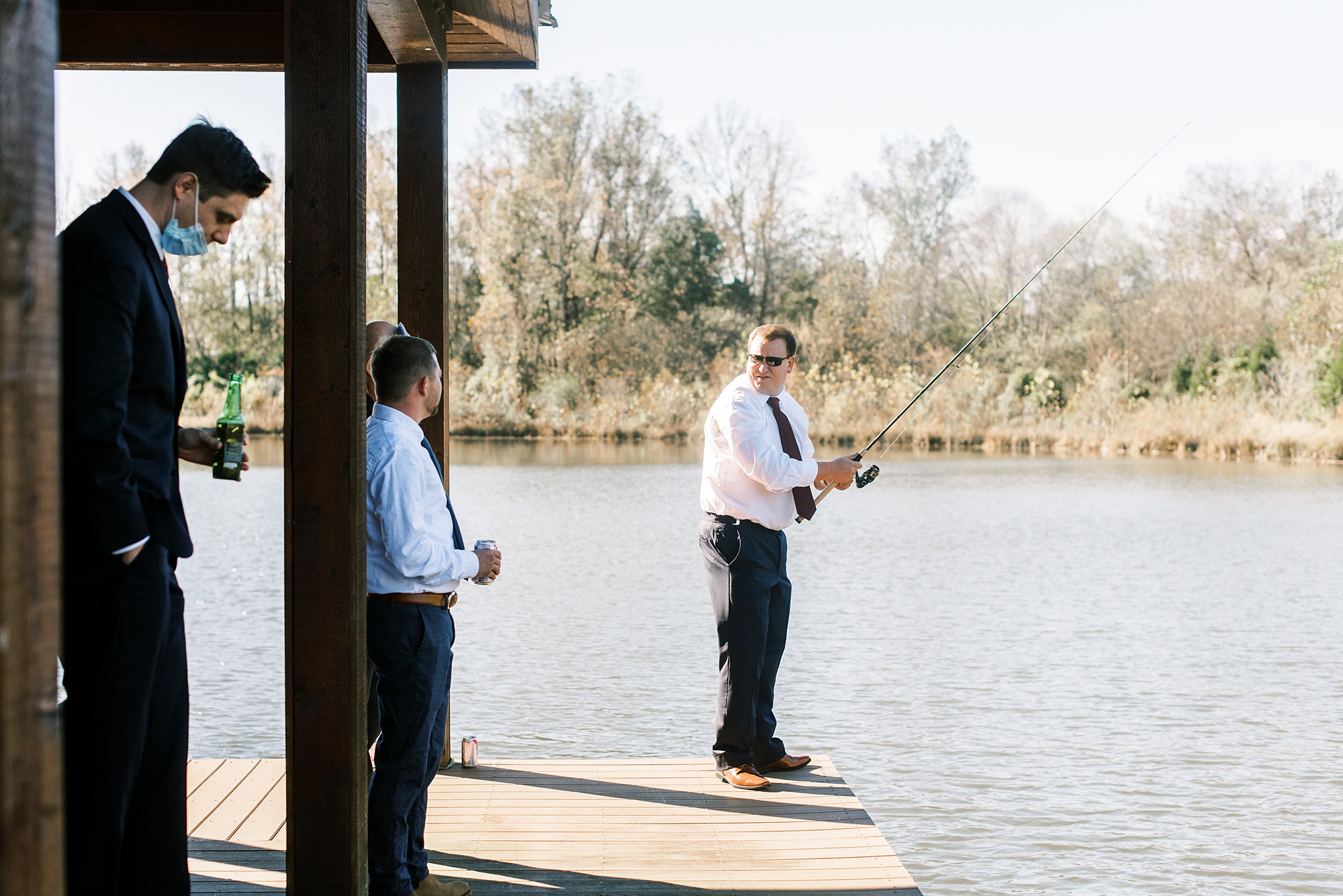 groom fishes before Arbors Events wedding