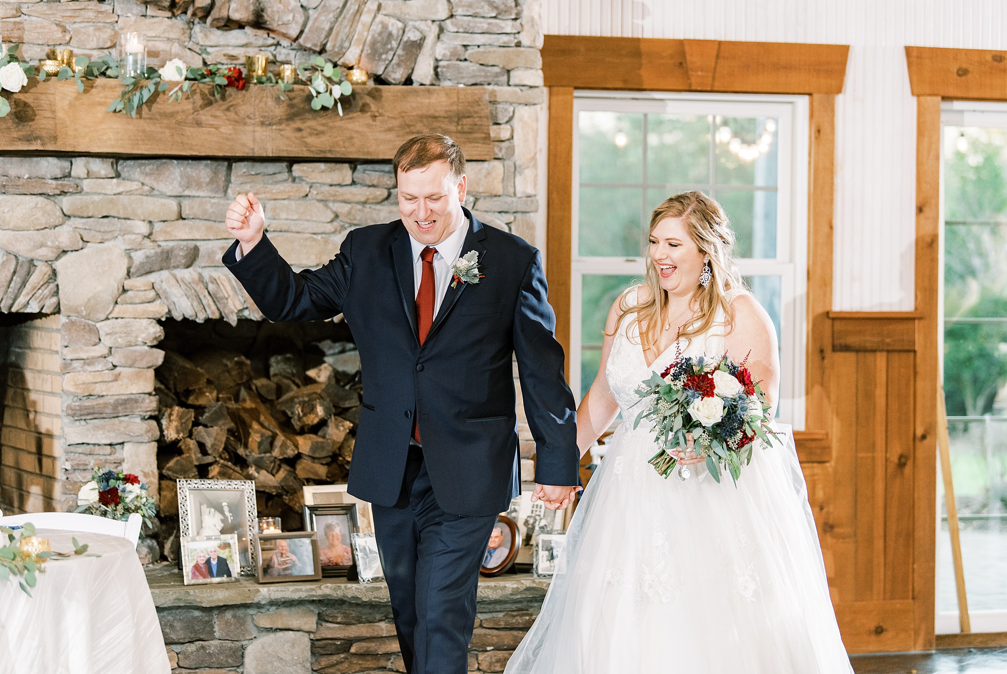 newlyweds enter wedding reception