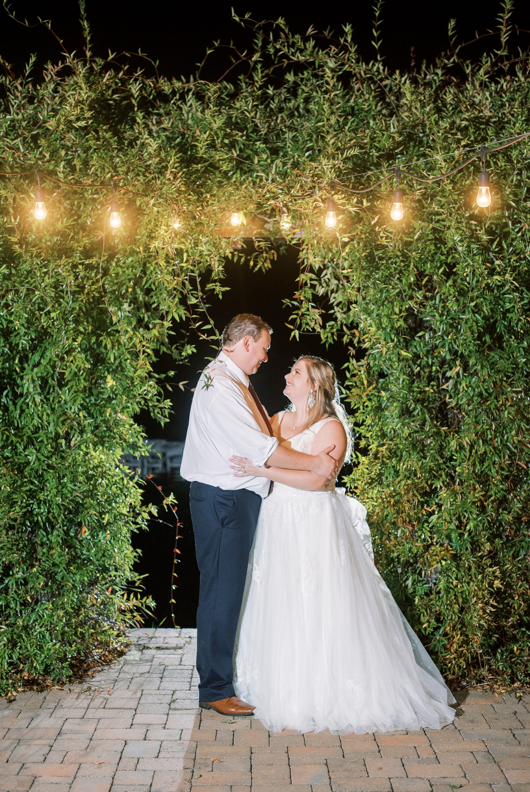 nighttime portraits under string lights in NC