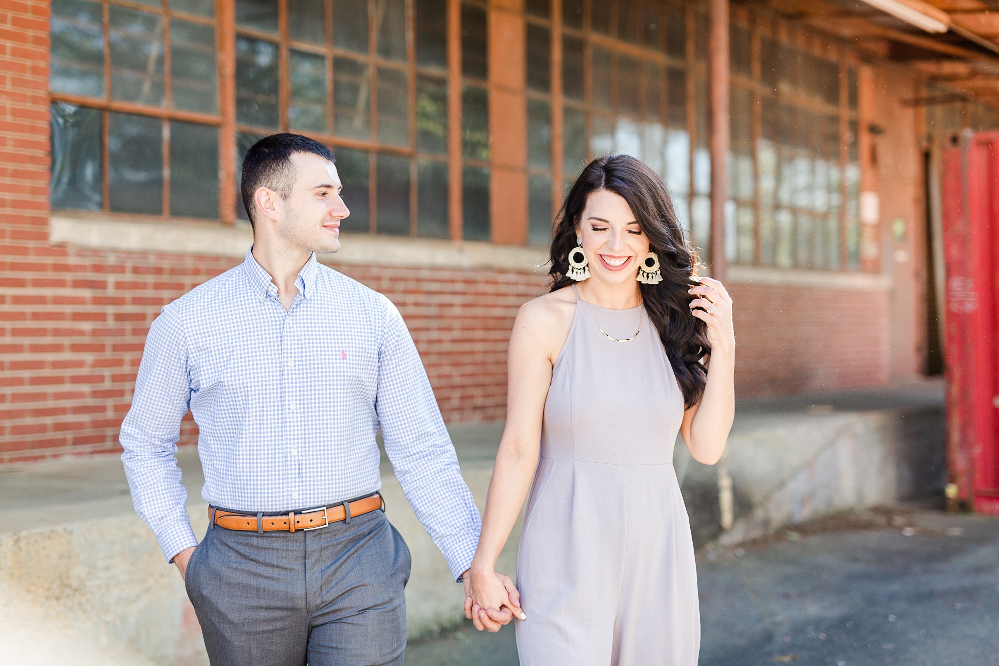 Charlotte NC engagement photos by warehouse in Charlotte NC