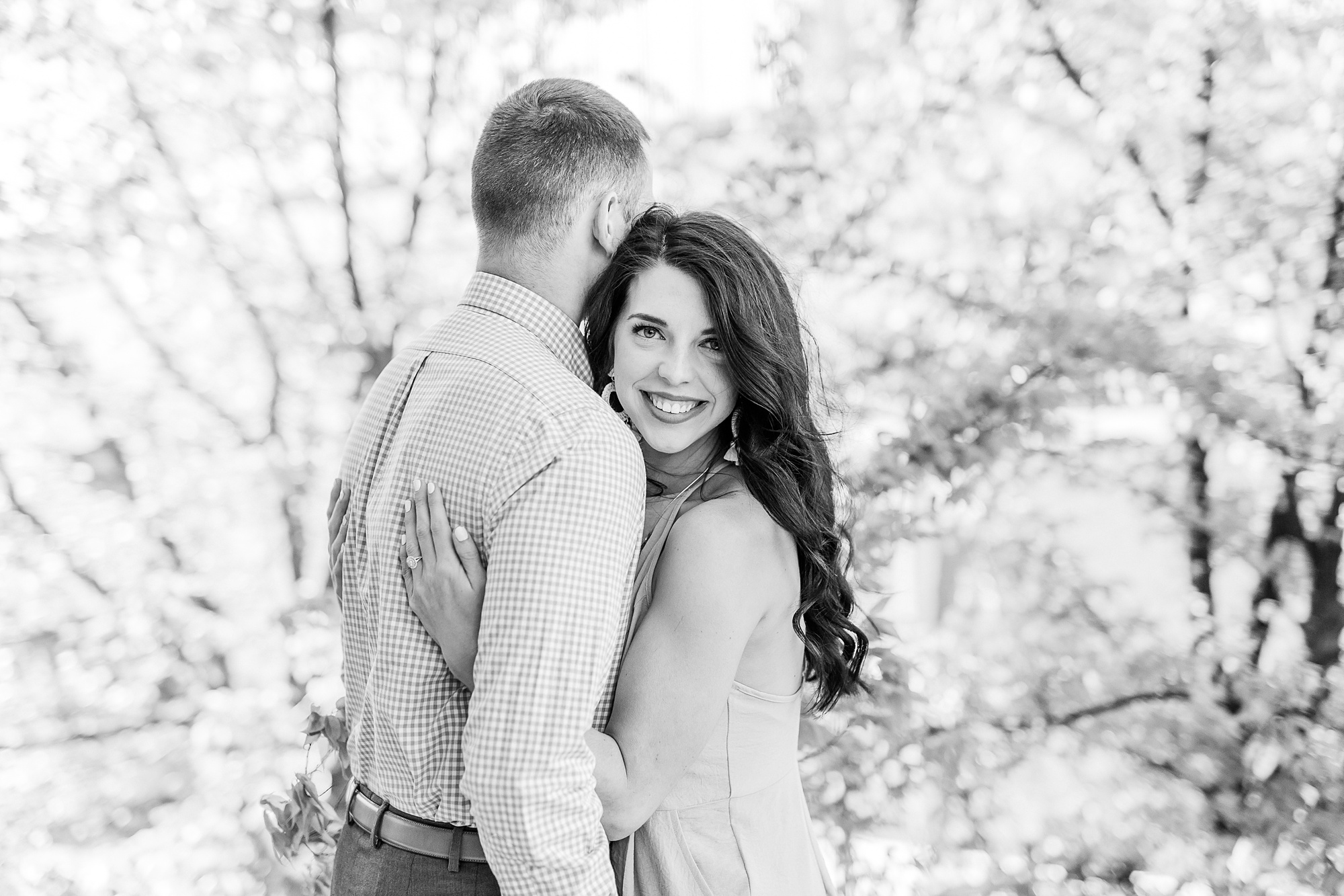 bride hugs groom in Camp North End