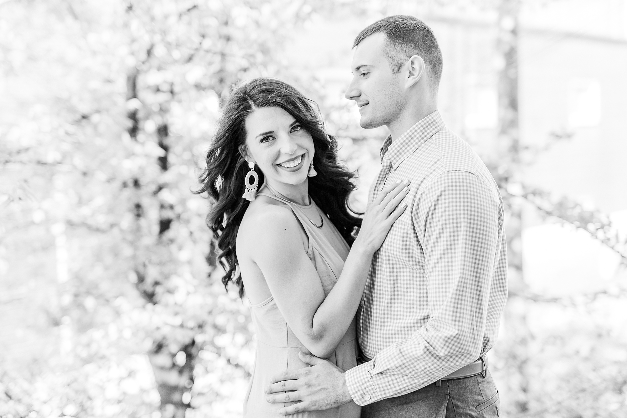 engaged couple stands together in Charlotte NC