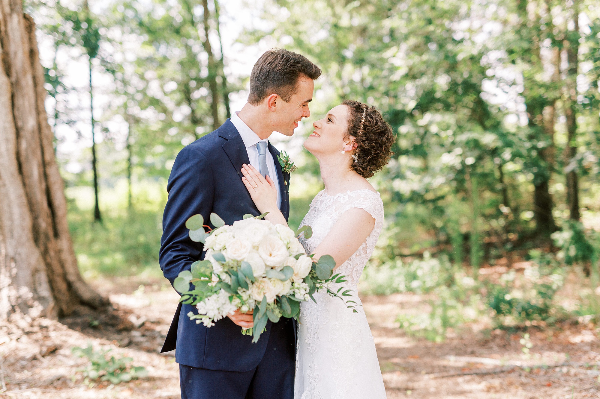 Elegant wedding in Charlotte NC photographed by Kevyn Dixon Photography with light blue and navy details