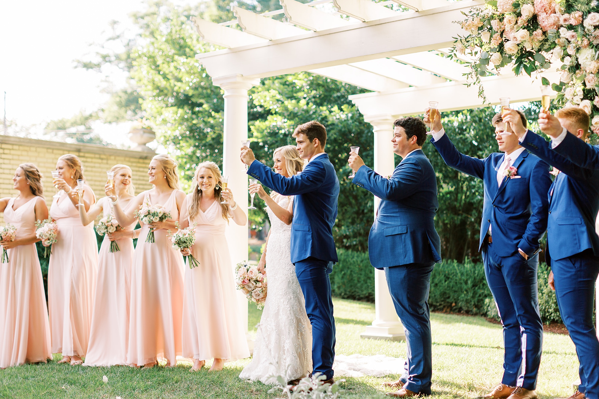Classic wedding day with pink and navy details at Separk Mansion and downtown Charlotte